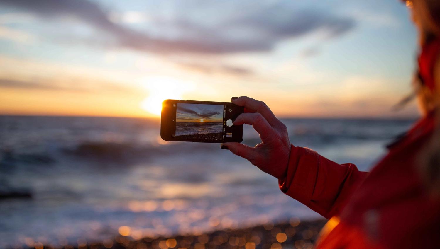 Telefon som tar bilde ut over Mølen