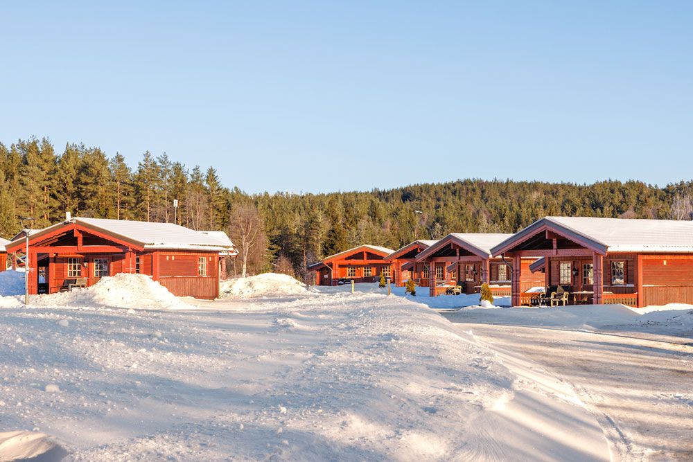 the cabins at First Camp Bø in winter