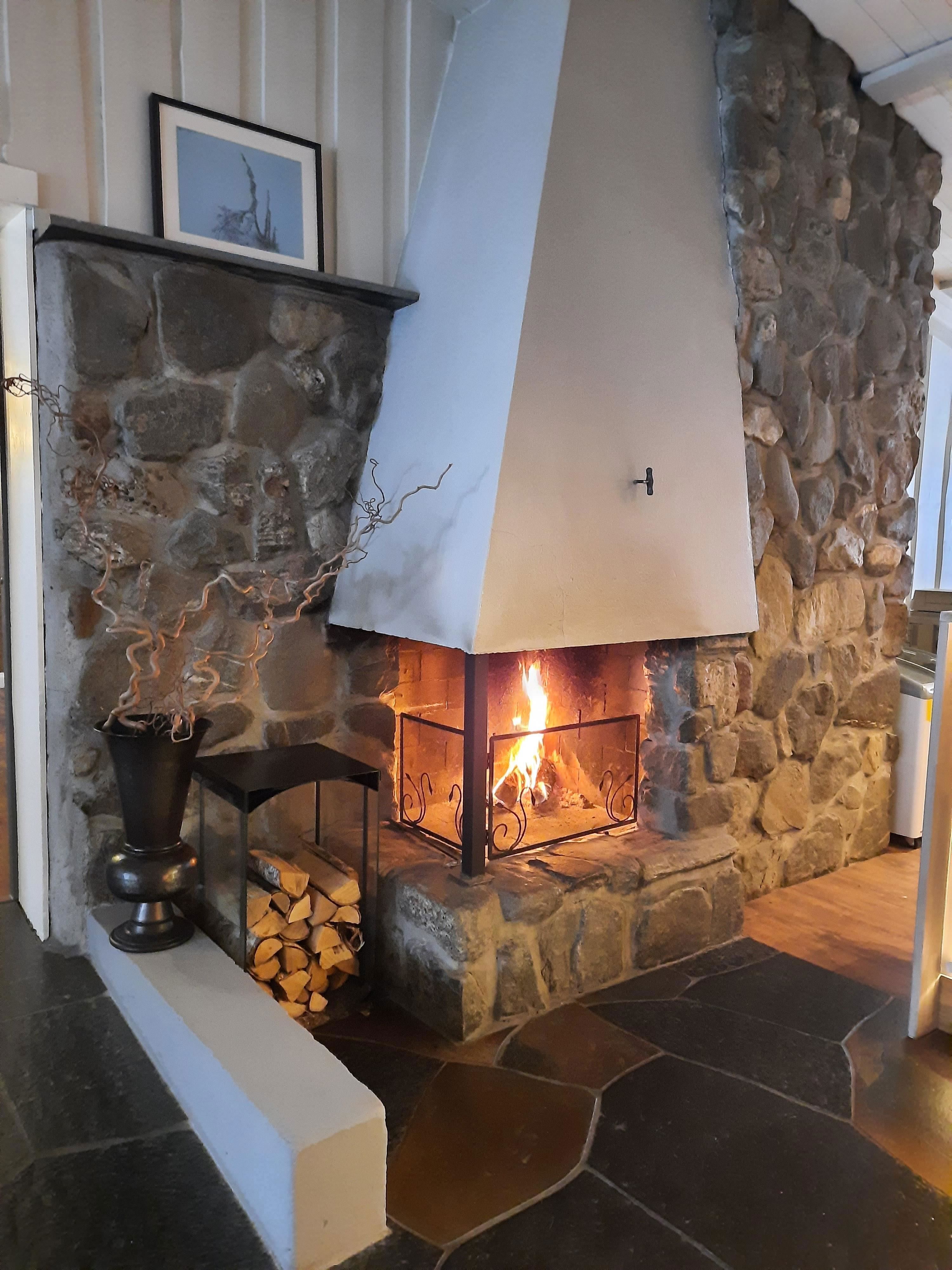 Fireplace at the reception at Hafjell Hotel