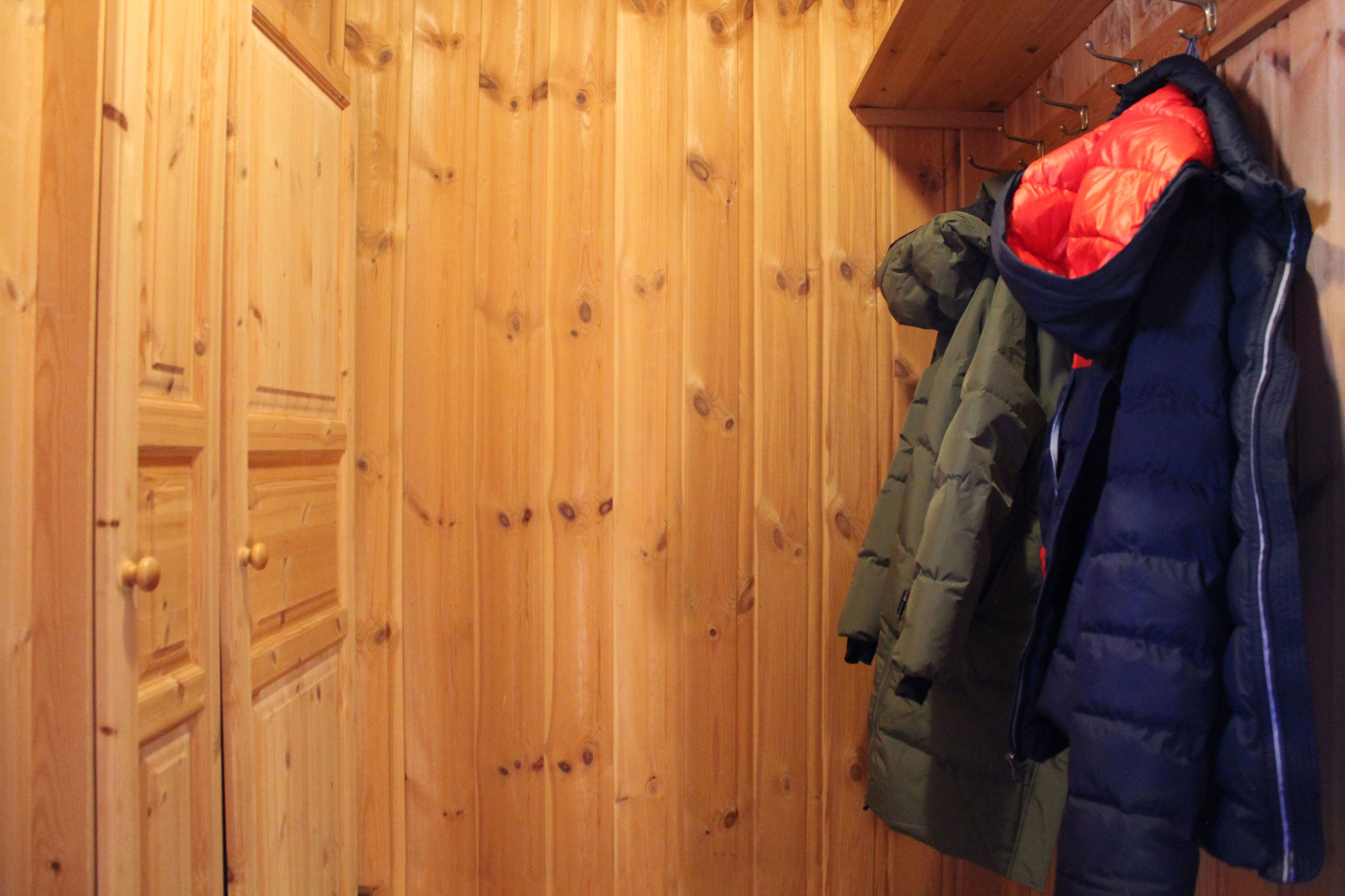 A clothes rack in a room.