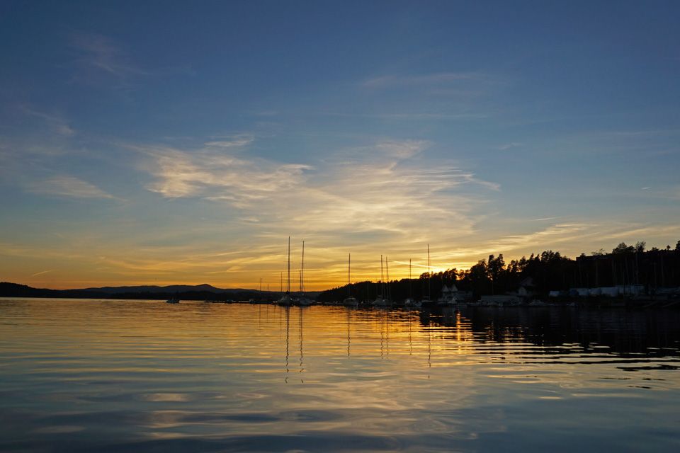 The sun setting above the sea.