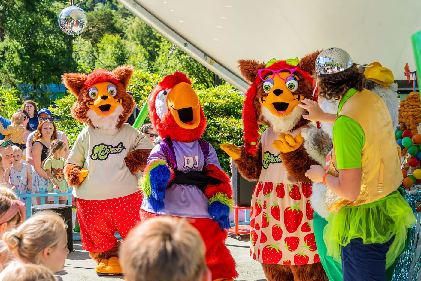 Mikkelparken mascots entertaining children during a family show