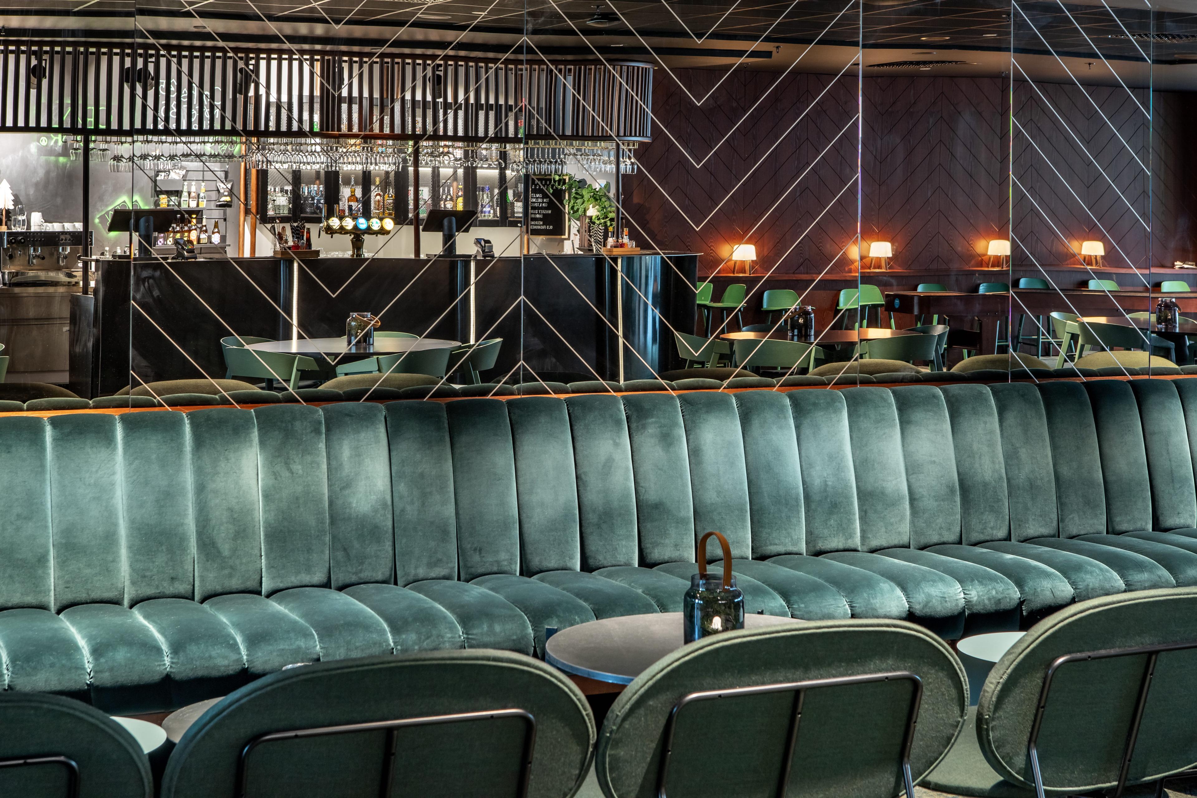 green sofa in a bar