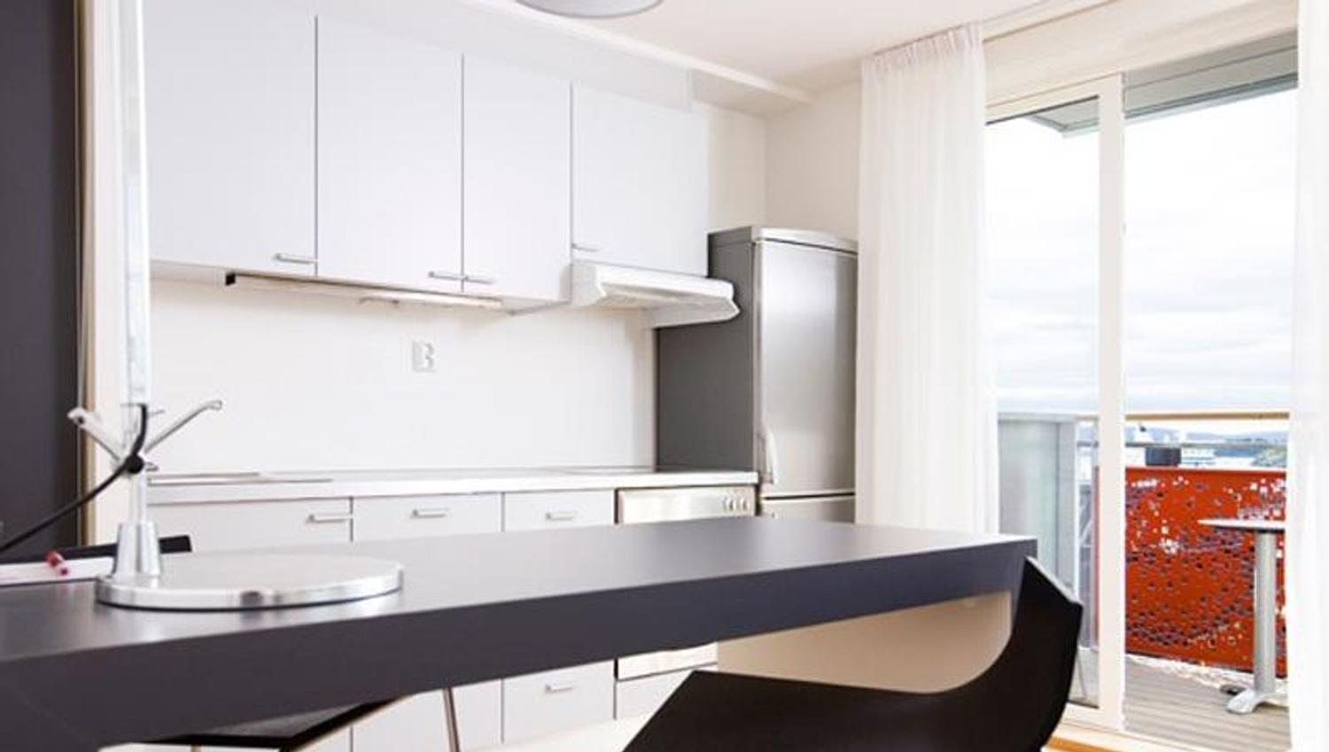 bright kitchen with seating