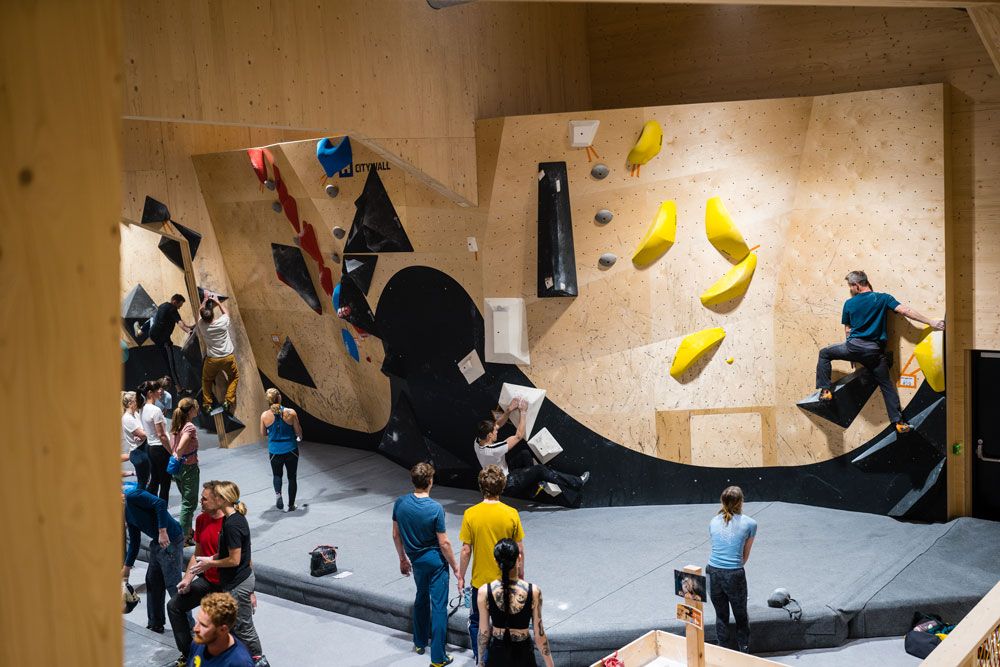 people climbing at "High under the roof"