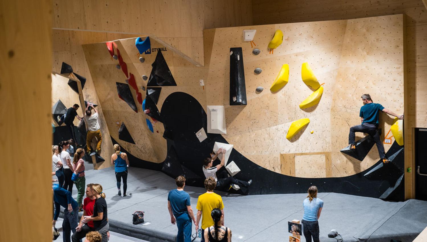 people climbing at "High under the roof"
