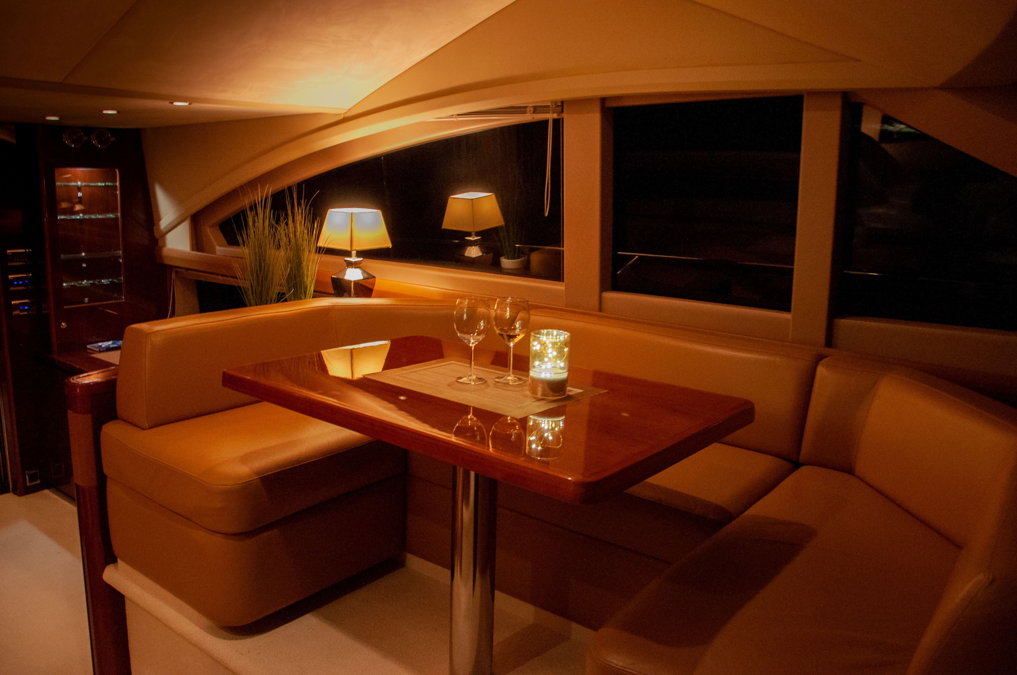 Private yacht cruise in the Bergen area, inside the salon after dark
