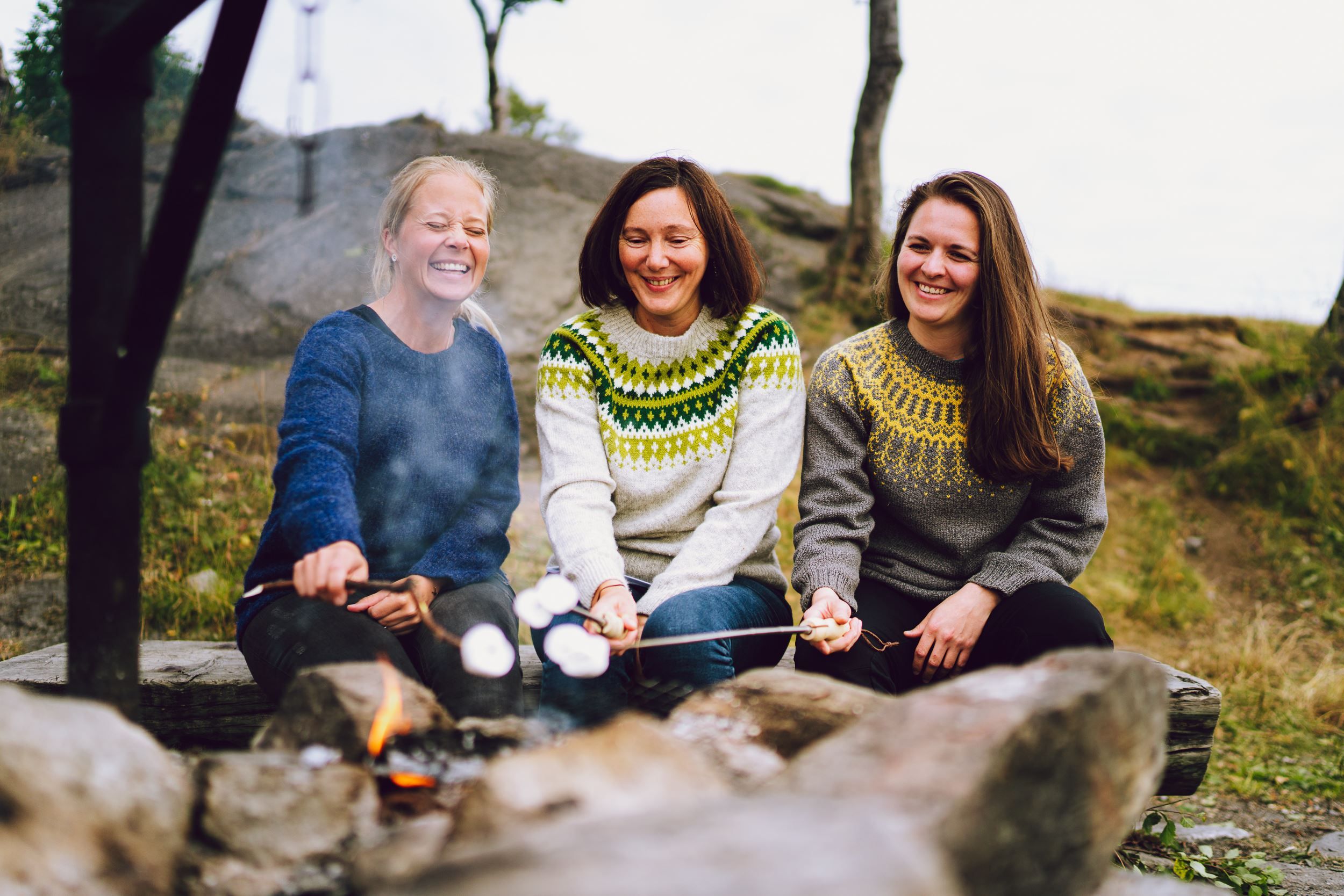 three friends barbecuing