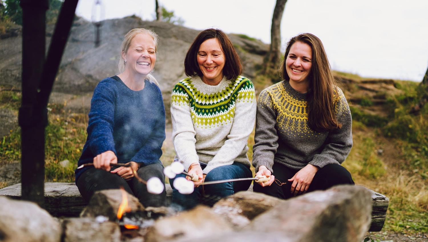 three friends barbecuing