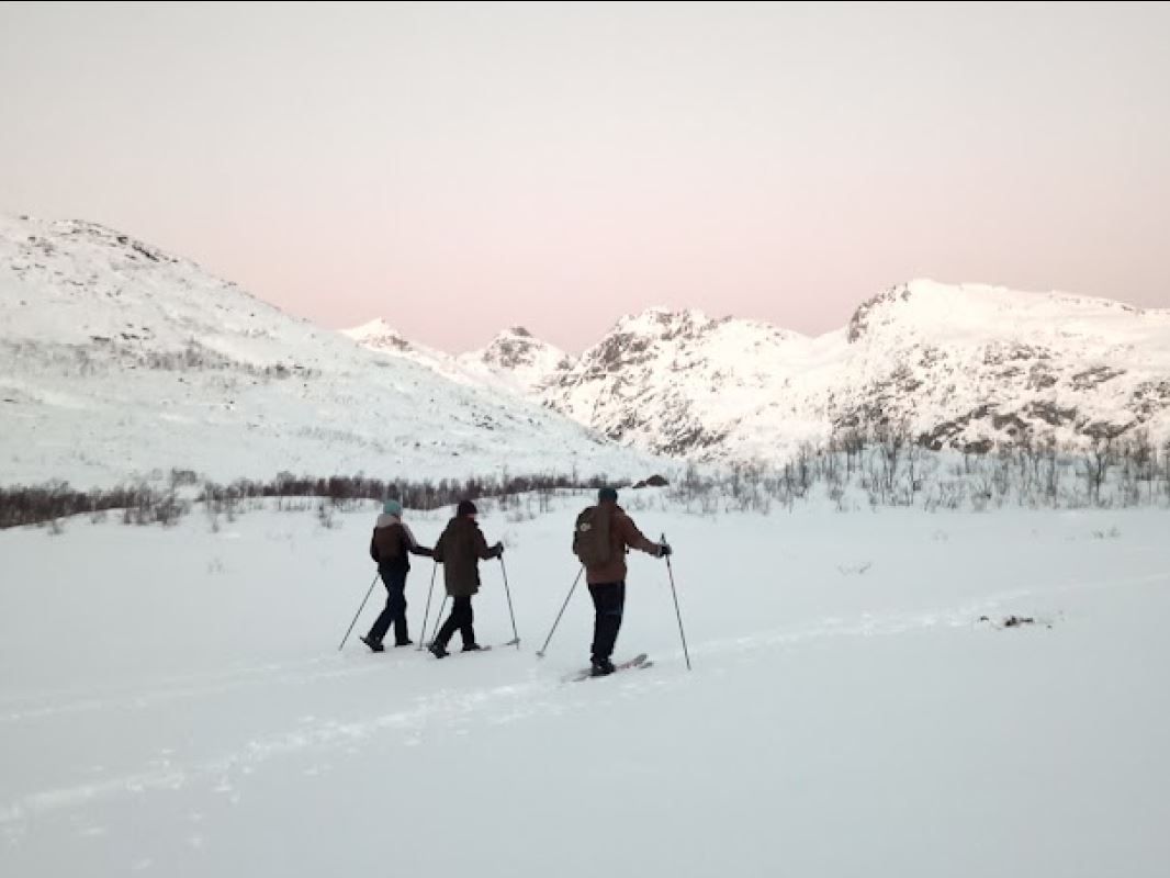 Guests ski the trail through the mountains