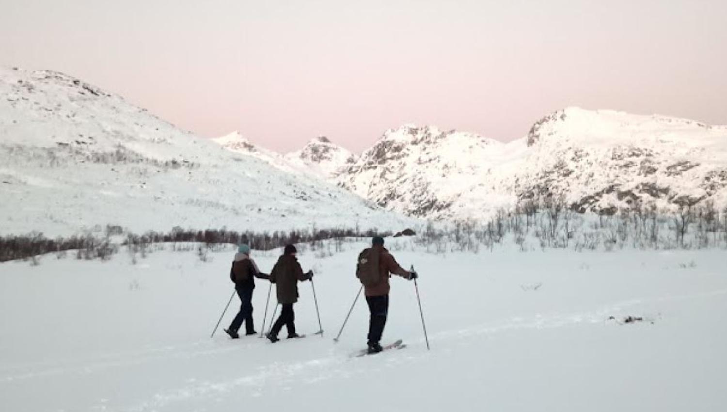 Guests ski the trail through the mountains