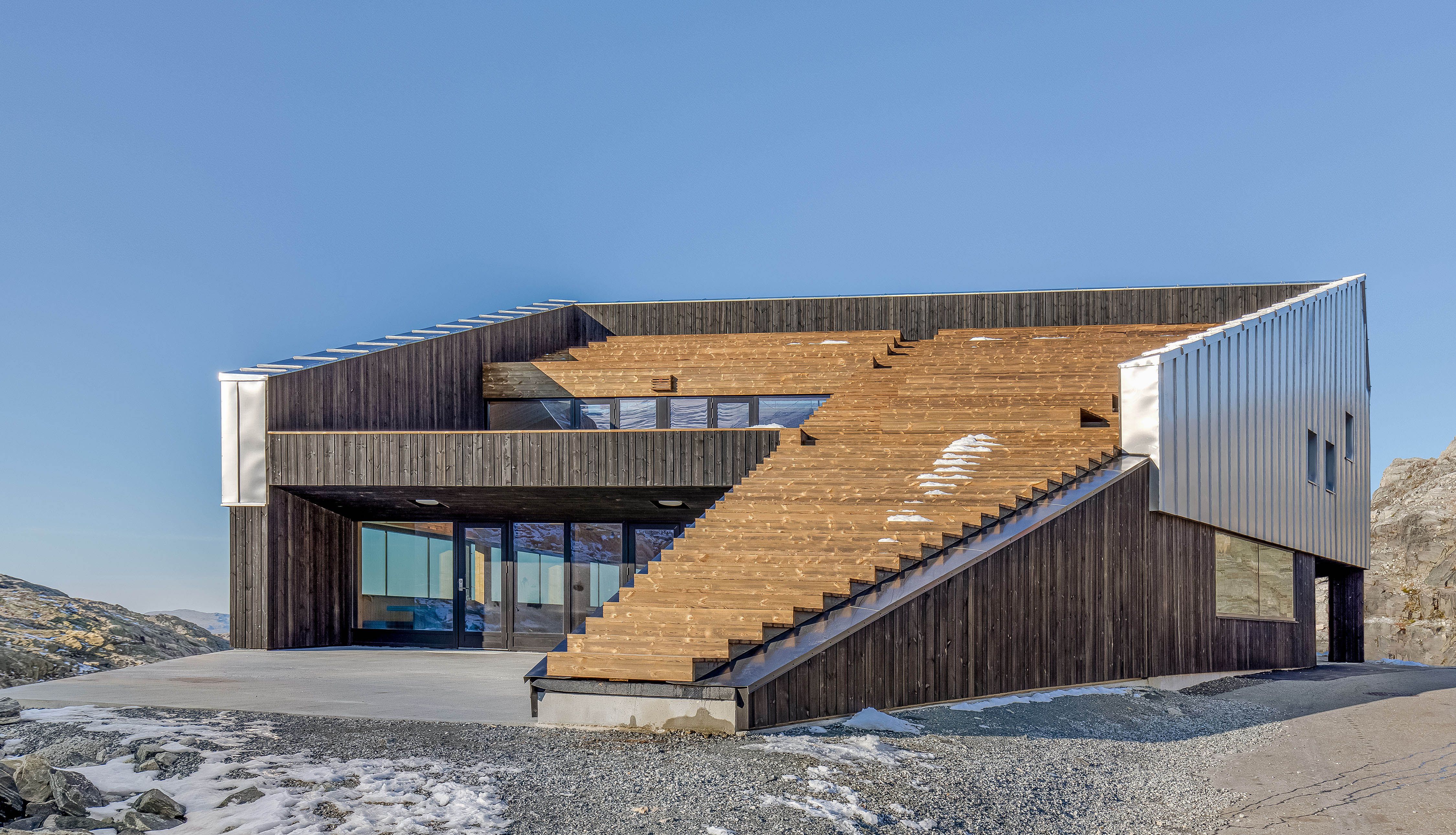 Outdoor stairs at Fonna1199 leading to a lookout point with breathtaking views of Folgefonna