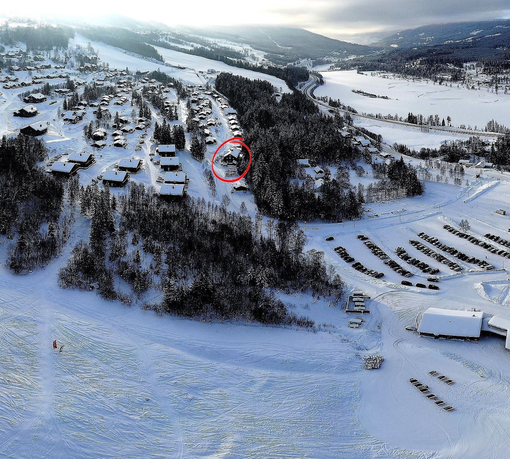 An aerial photo of a snow-covered mountain mountain.