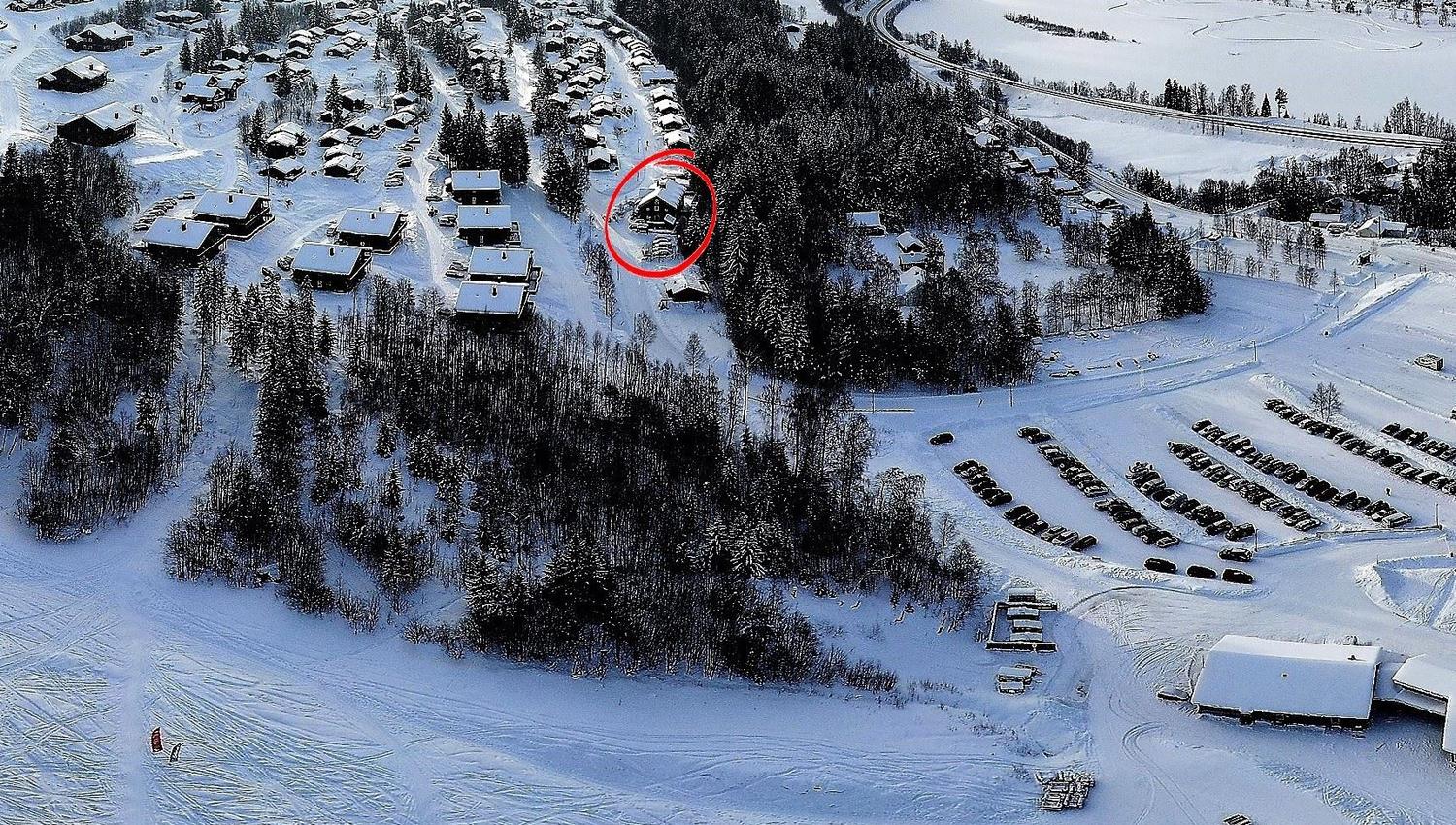 An aerial photo of a snow-covered mountain mountain.