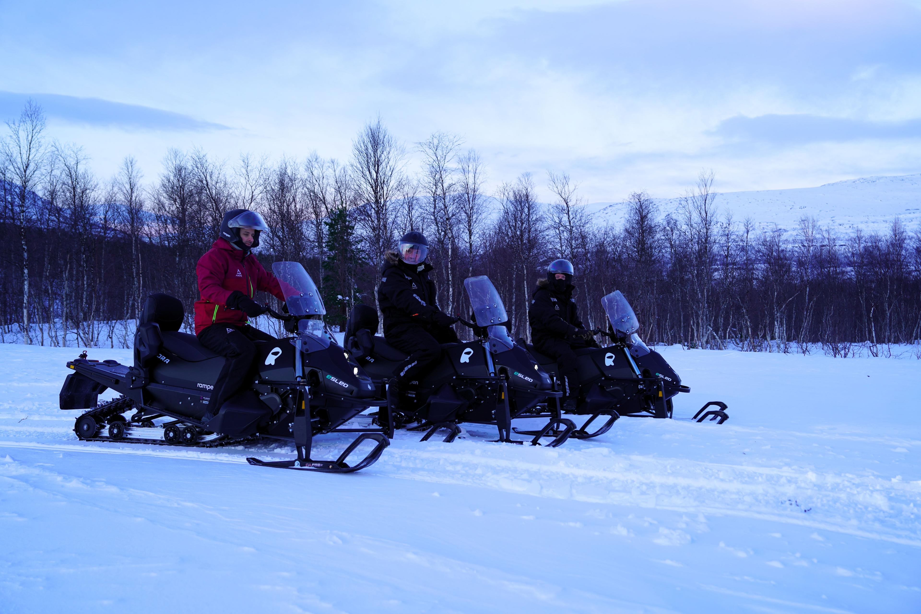 Snowmobiling in the Arctic wilderness