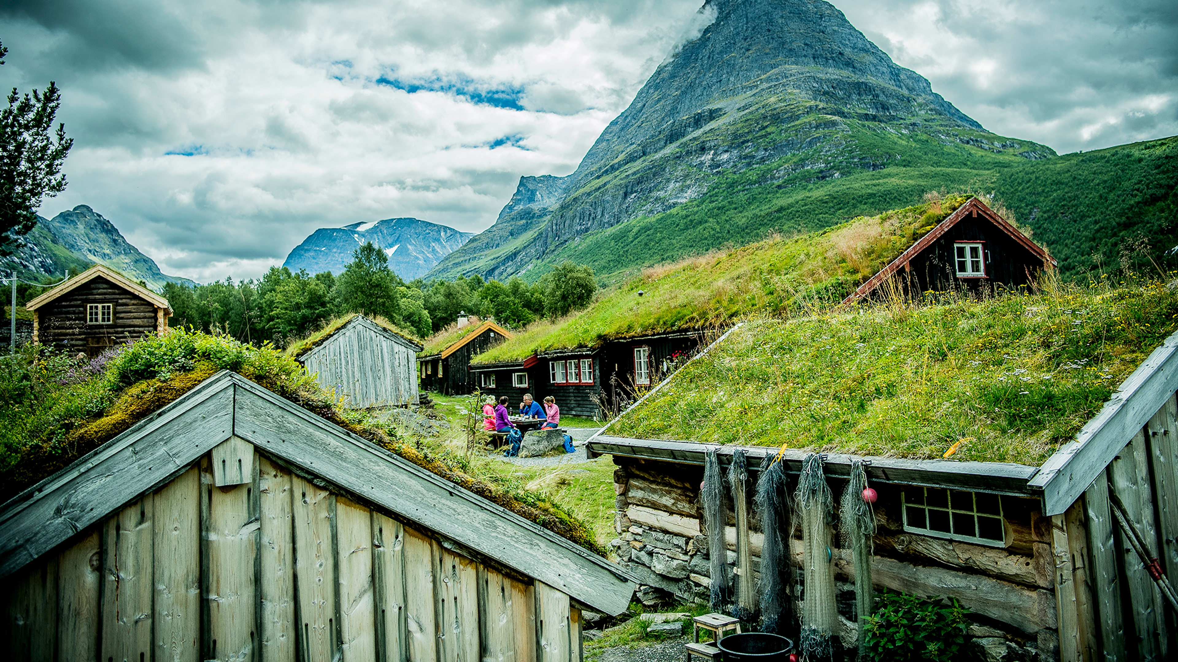 Thatched houses at Renndølsetra in the Innerdalen valley in Northwest, Fjord Norway
