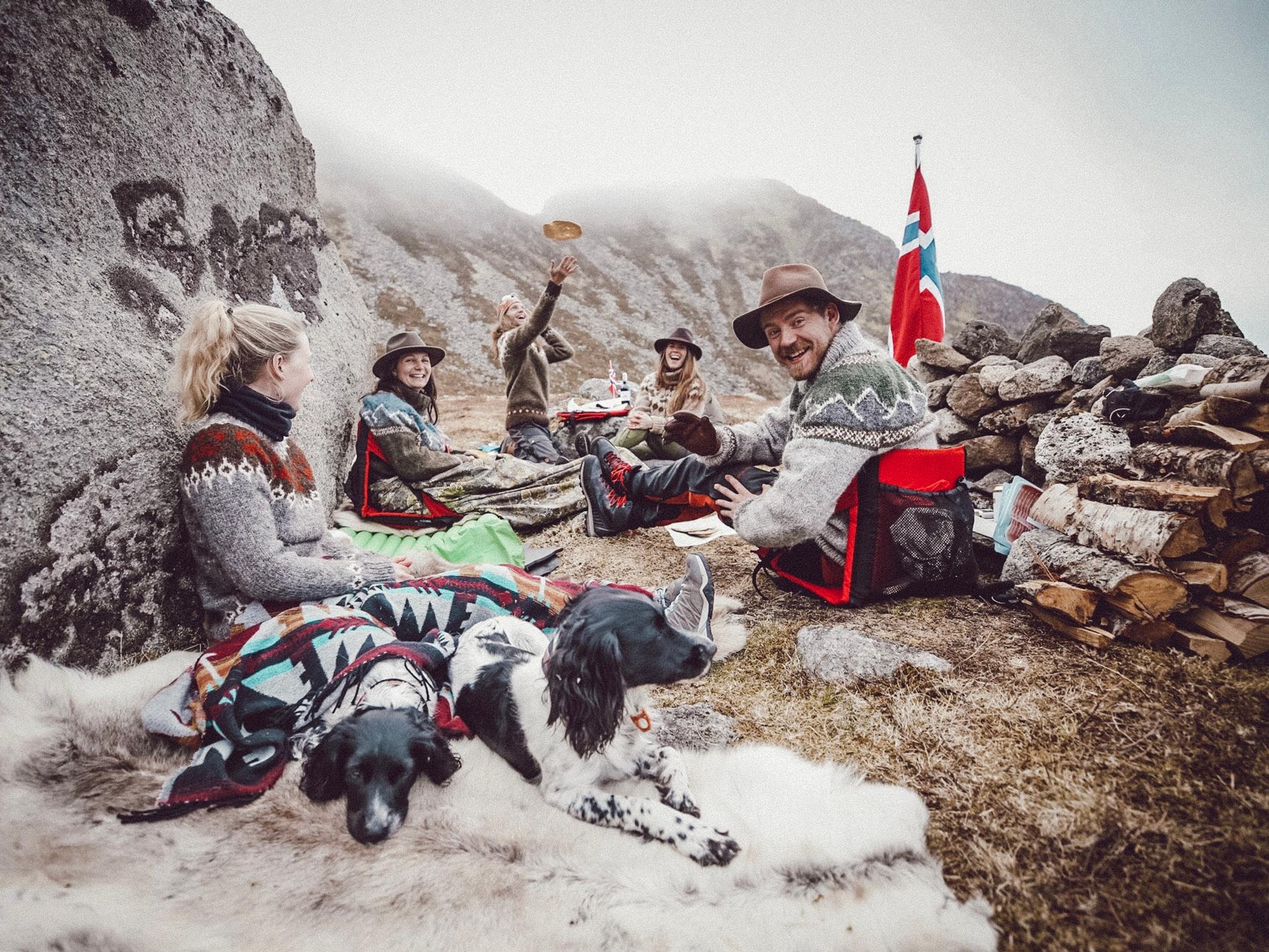 Friends celebrating in knitted sweaters