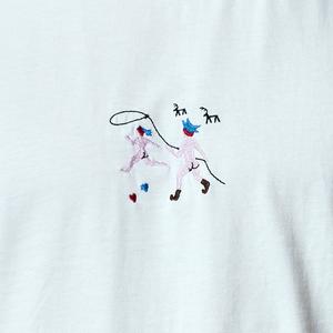 Embroidery of a naked Sami chasing another with a lasso