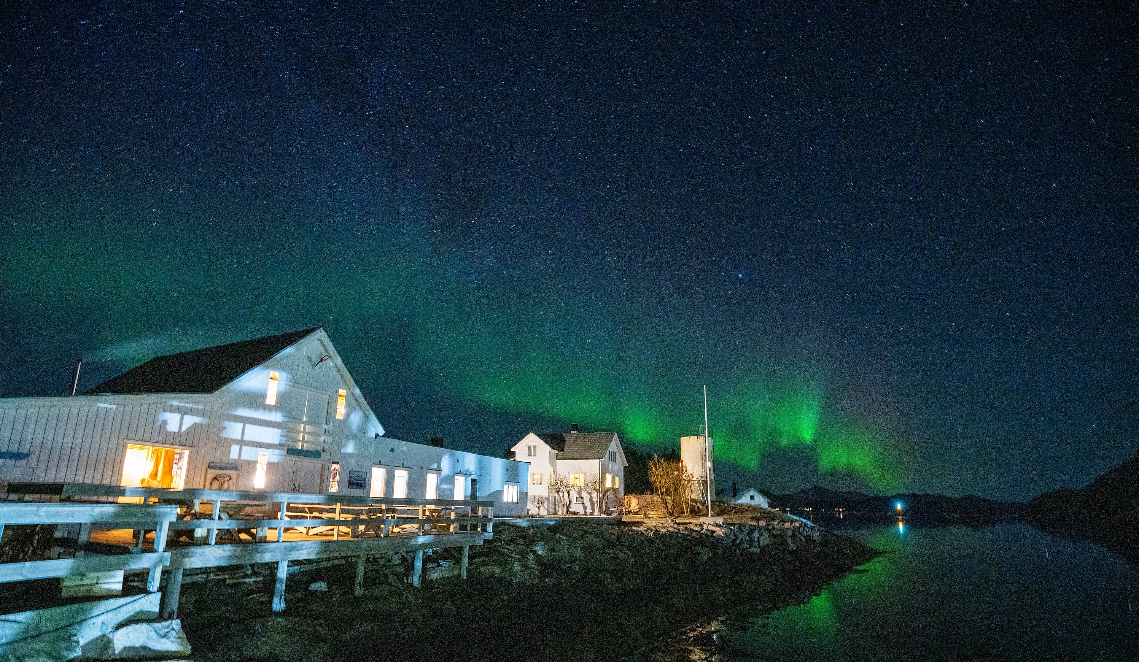 Northern lights over Naustholmen houses.