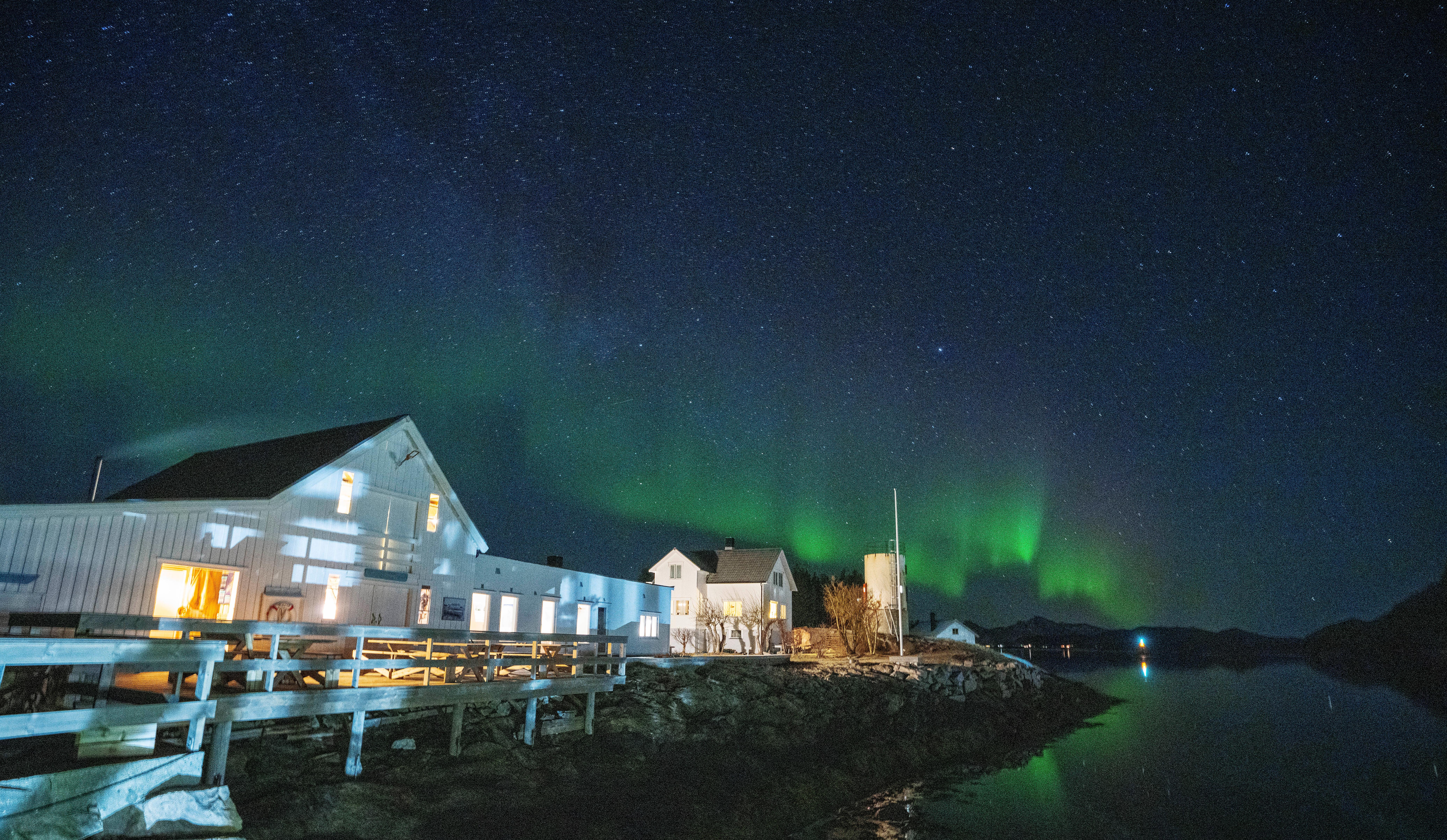 Northern lights over Naustholmen houses.