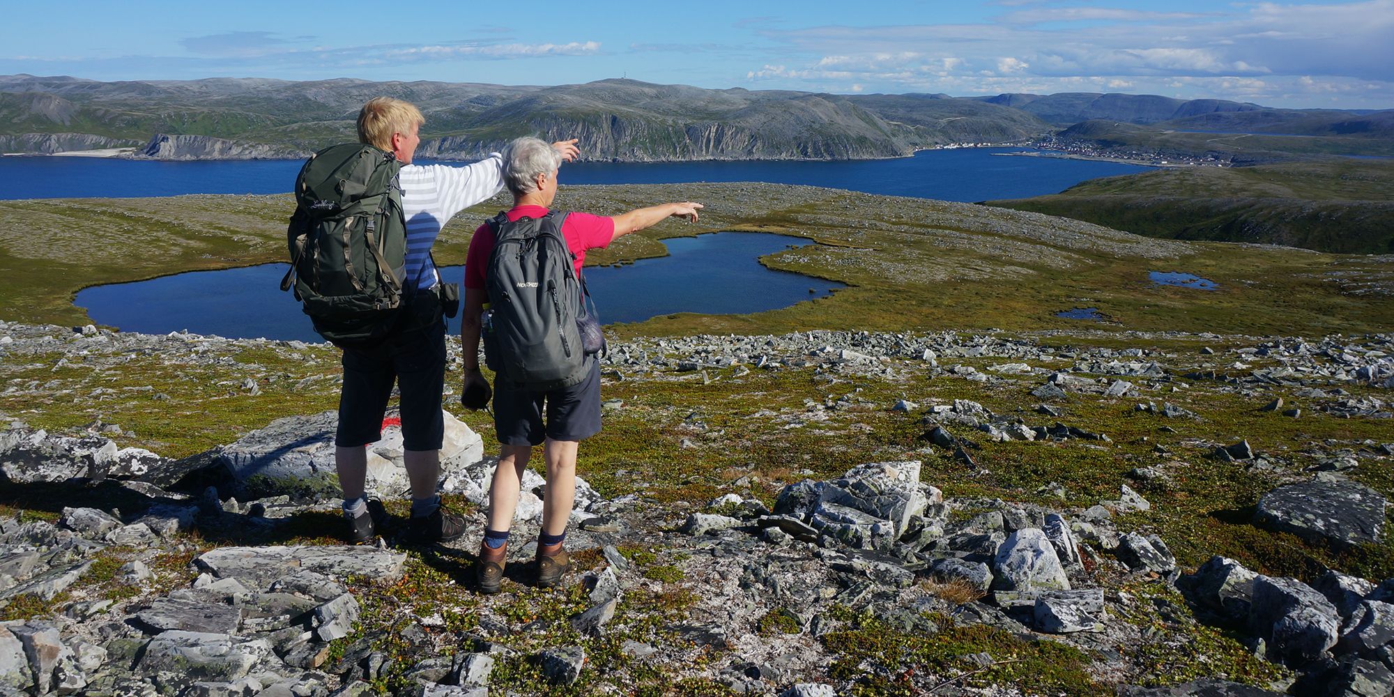 Two people hiking in Nordkyn, Northern Norway