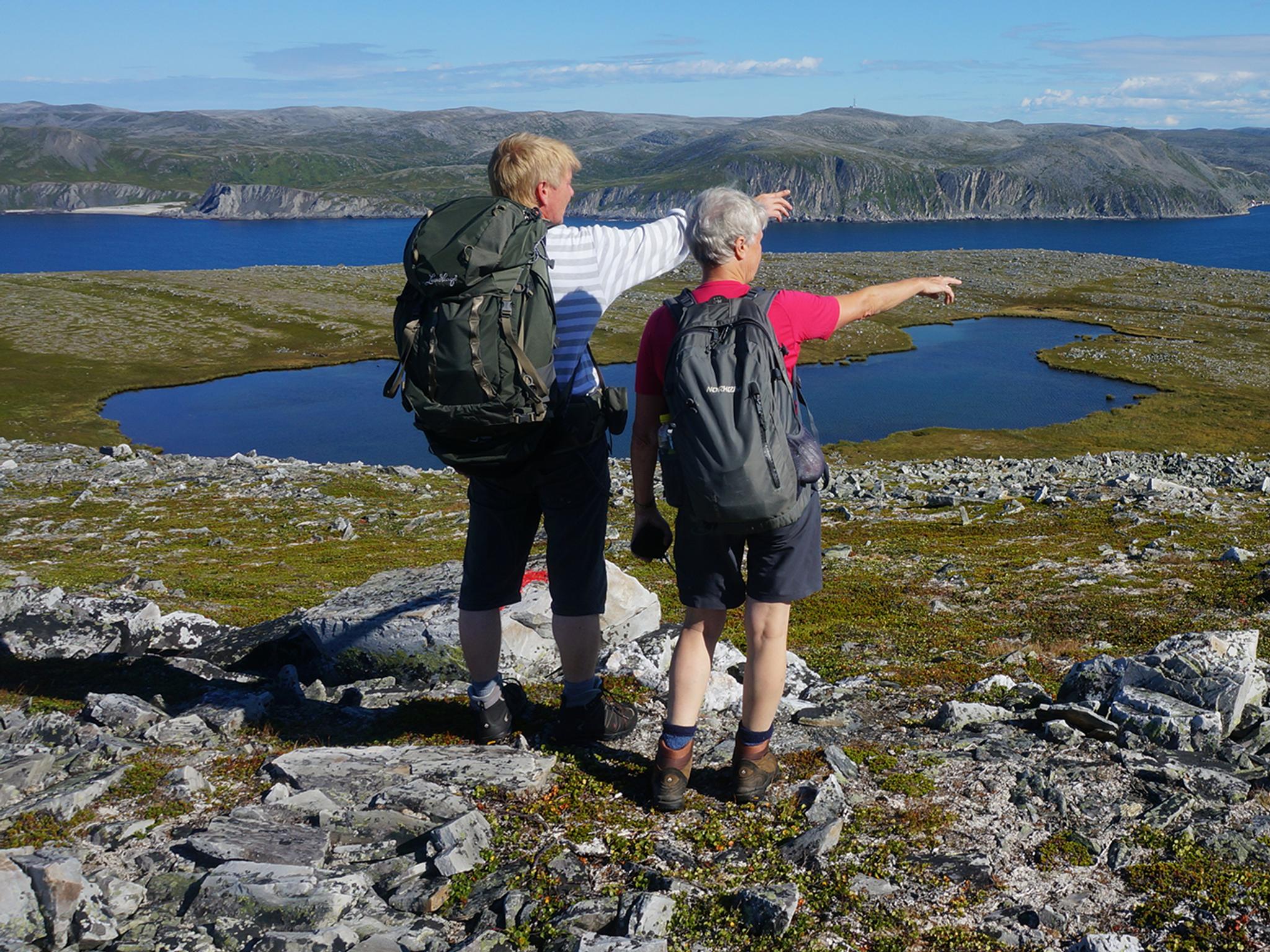 Two people hiking in Nordkyn, Northern Norway