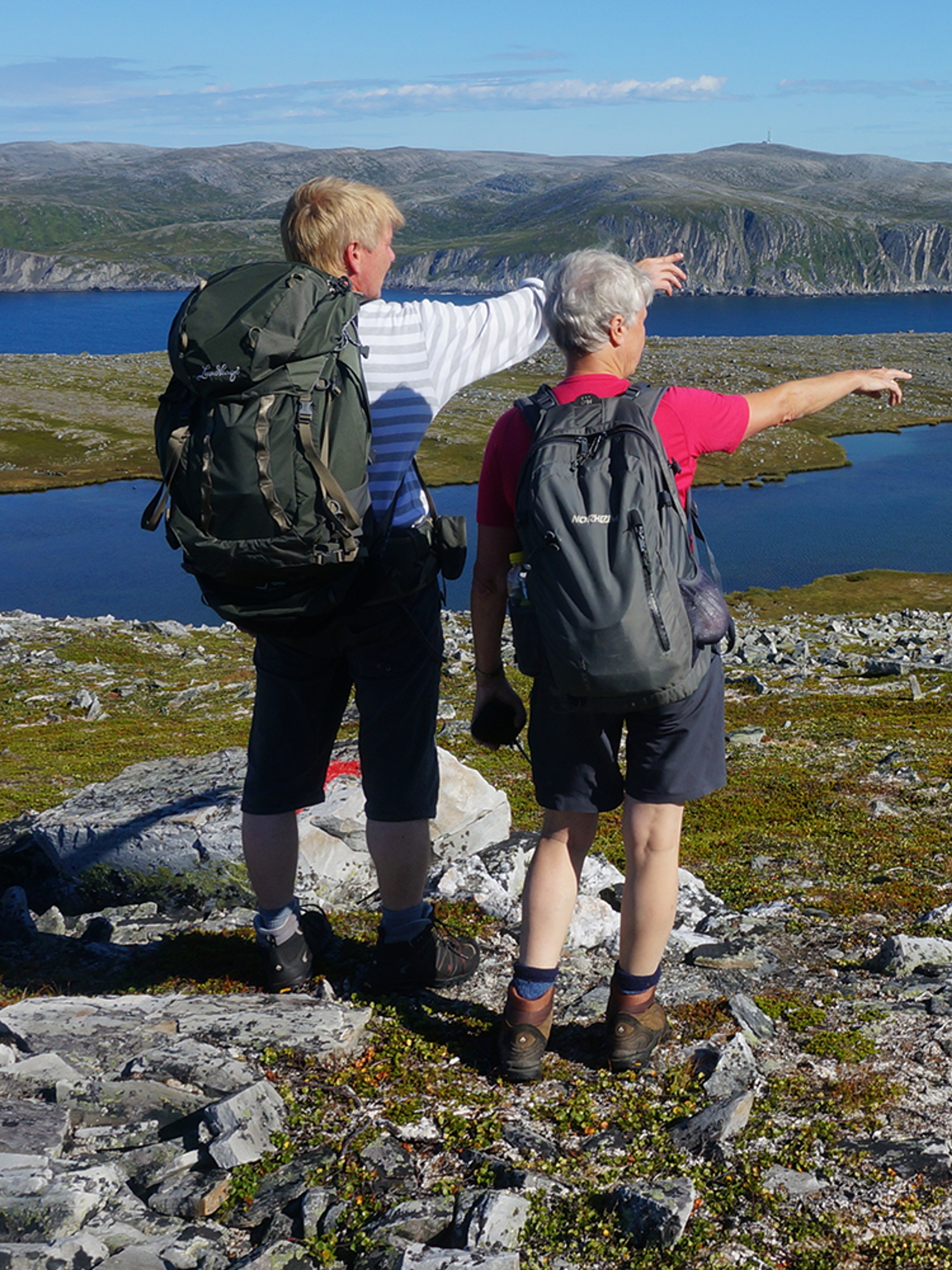 Two people hiking in Nordkyn, Northern Norway