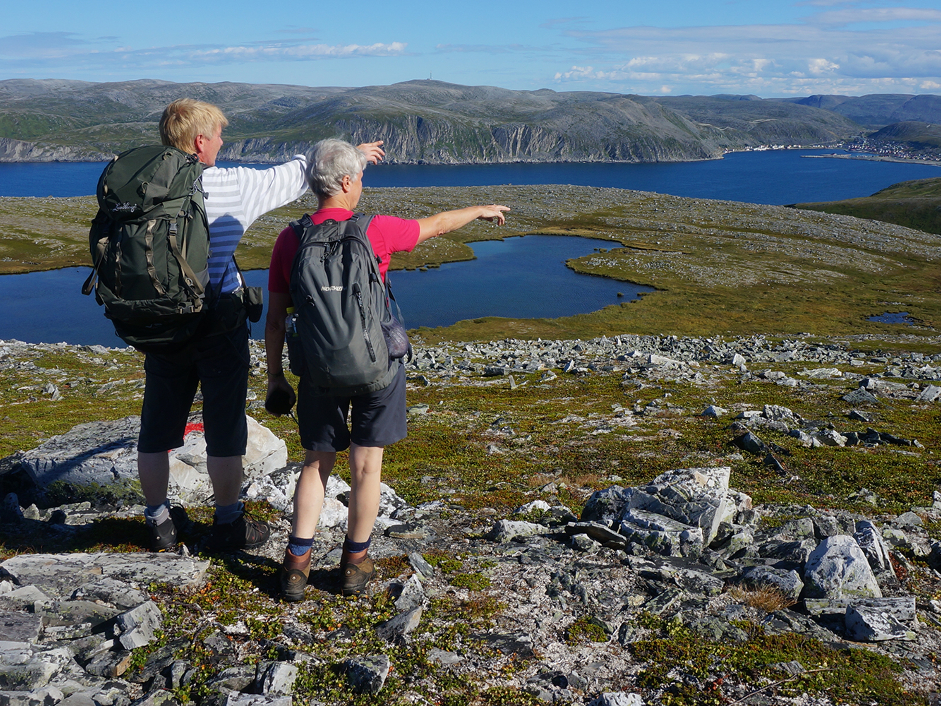 Two people hiking in Nordkyn