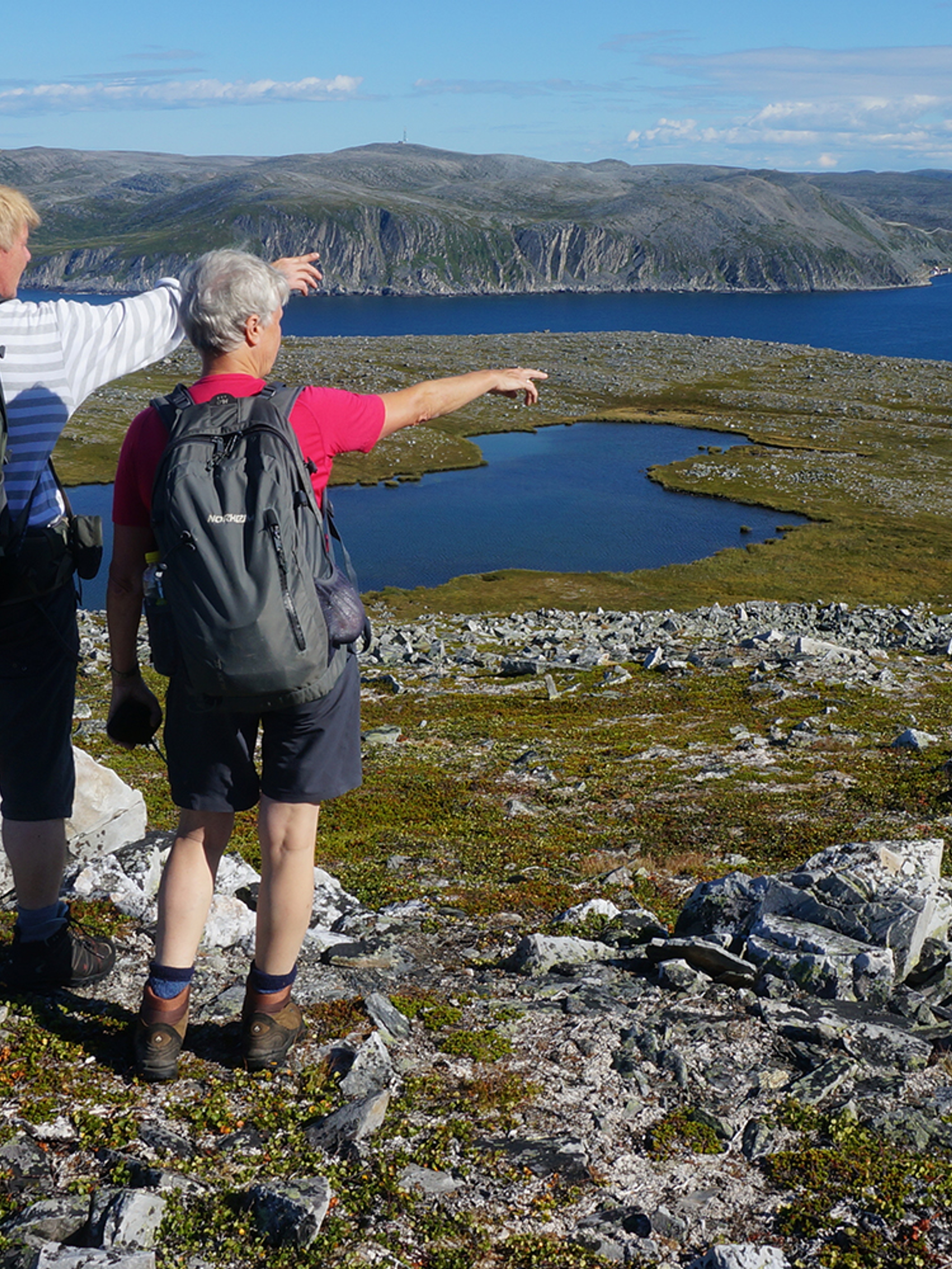 Two people hiking in Nordkyn