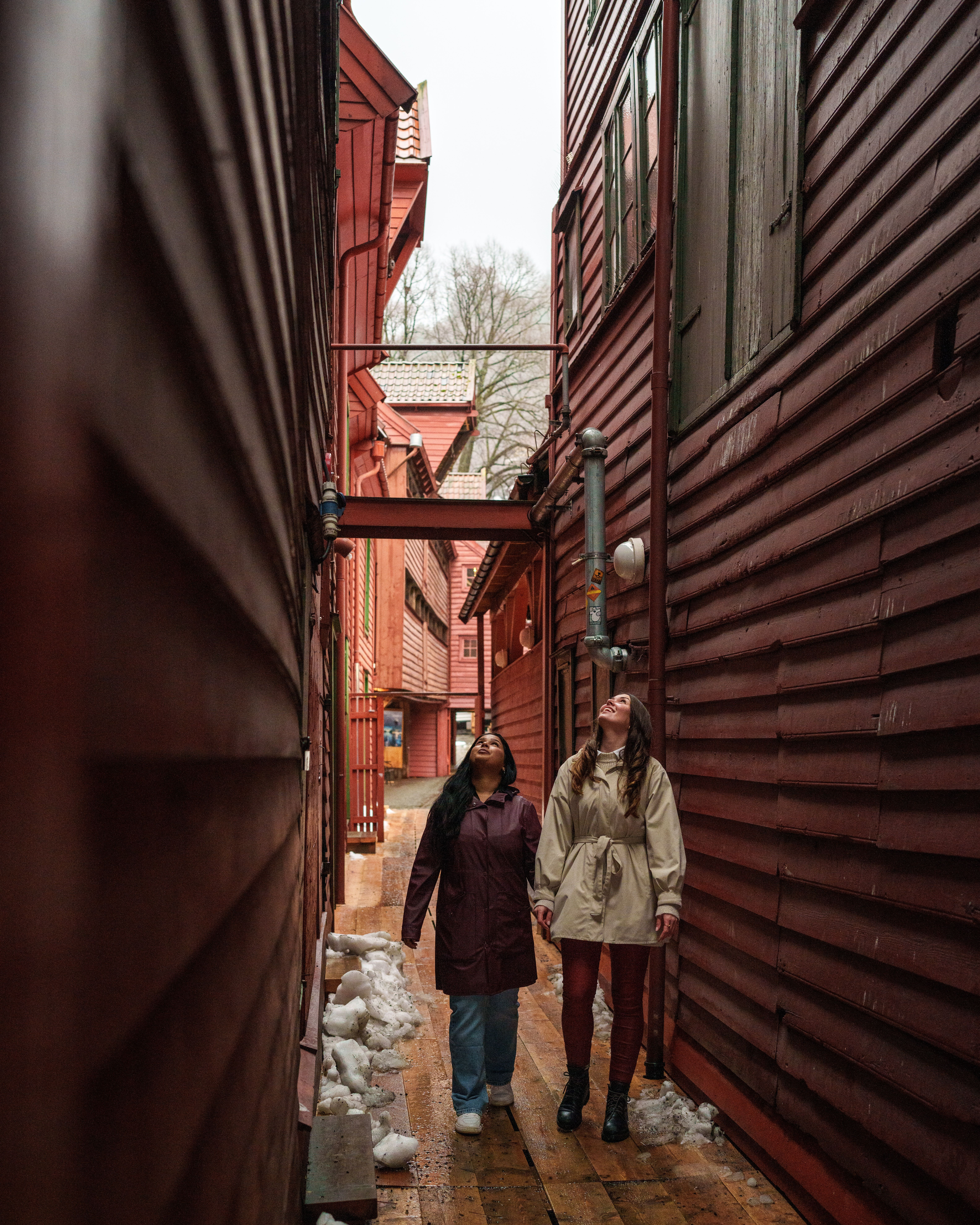 Two girls inside the Old Wharf in Bergen