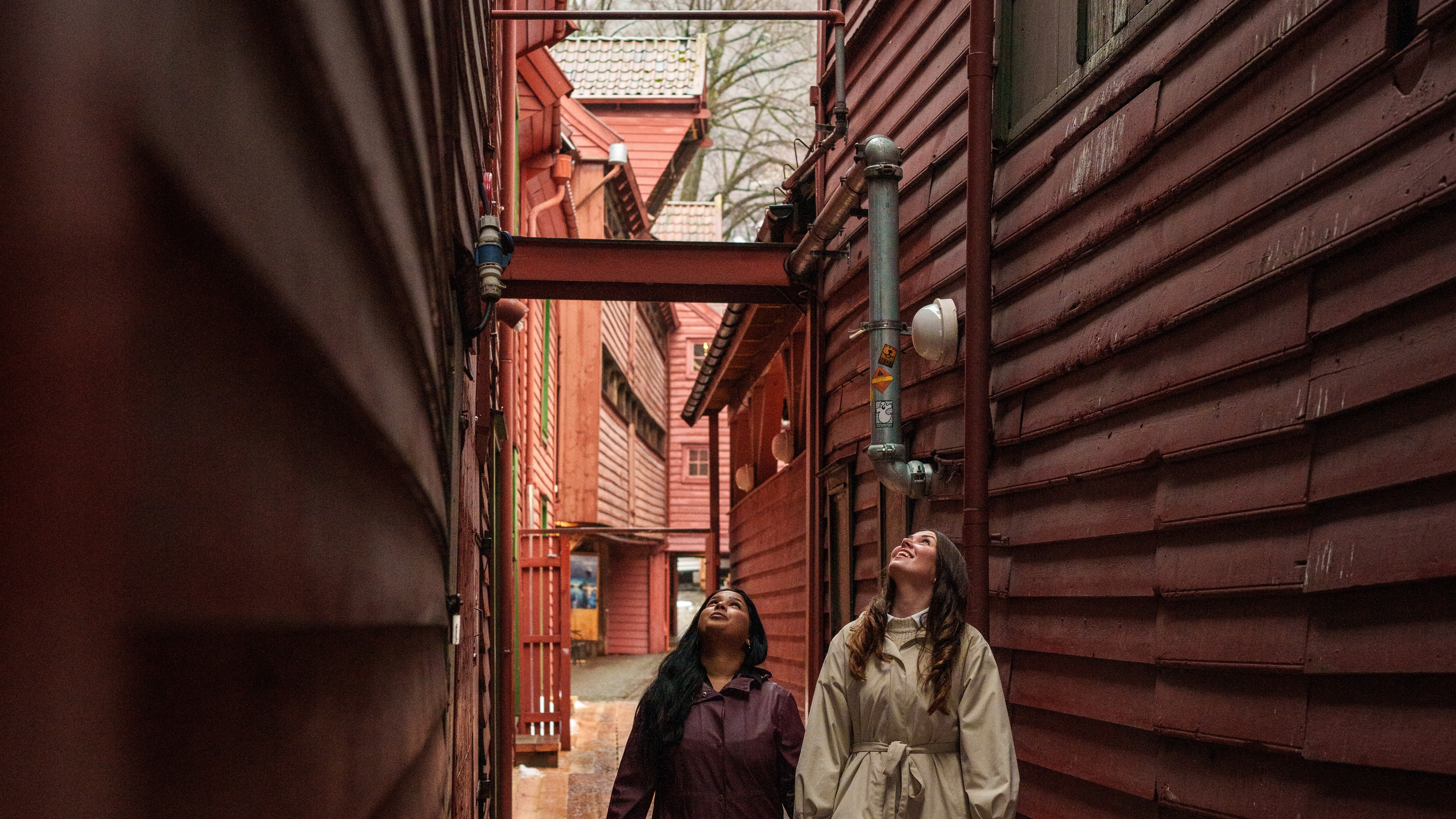 Two girls inside the Old Wharf in Bergen