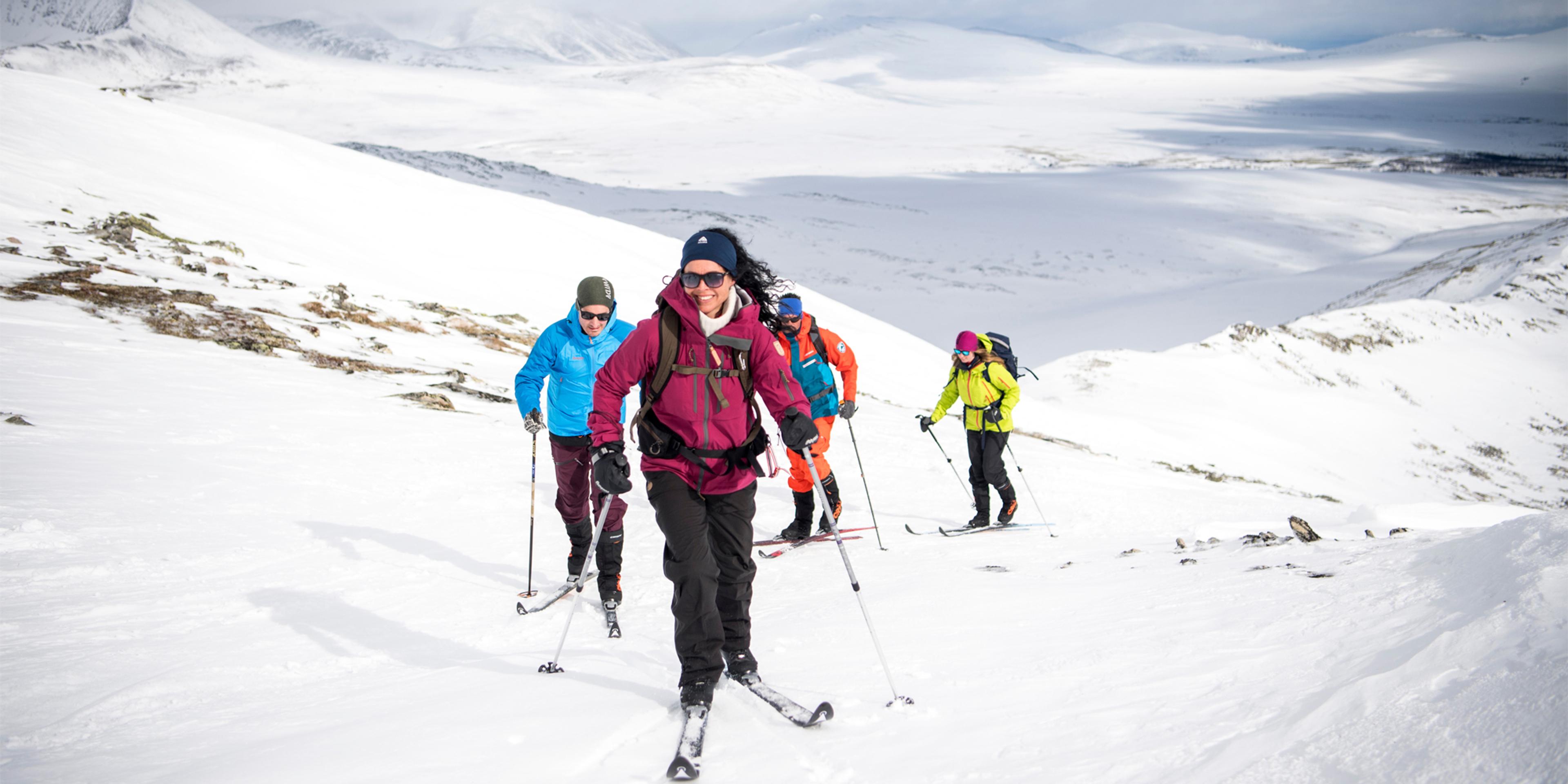 A group of people cross-country skiing in the Rondane mountains, Eastern Norway