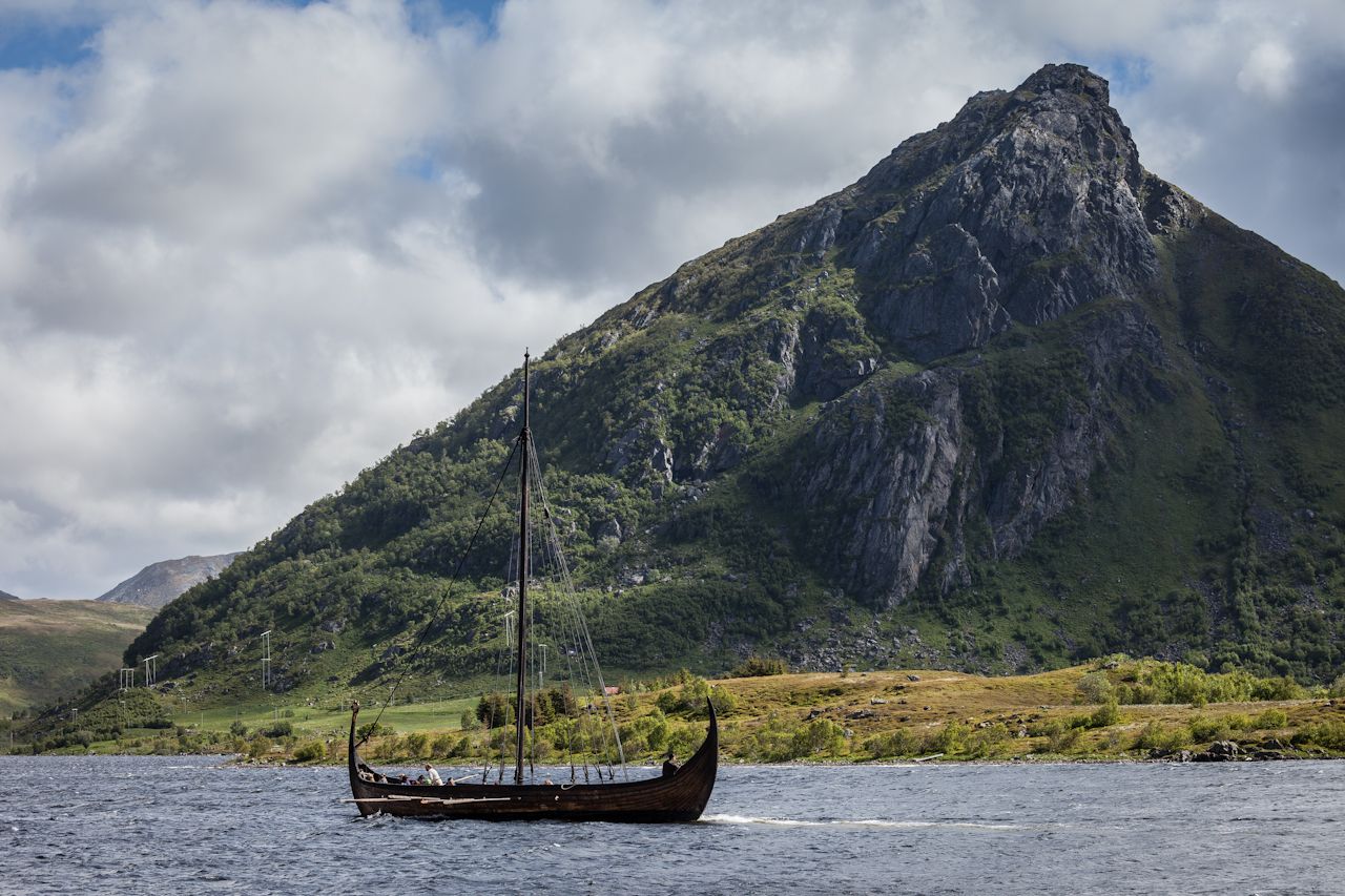 A traditional Norwegian Viking ship on the water near Lofoten, Northern Norway