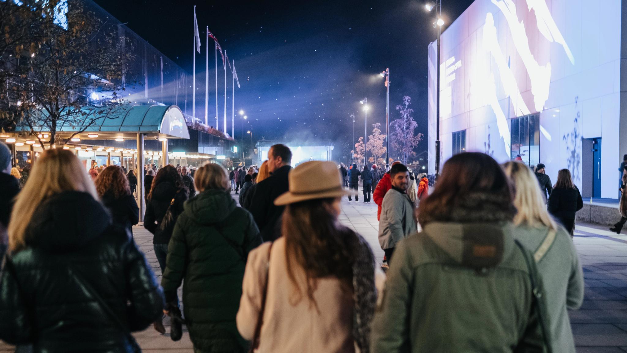 People are walking in the streets of Bodø in winter on a cultural event
