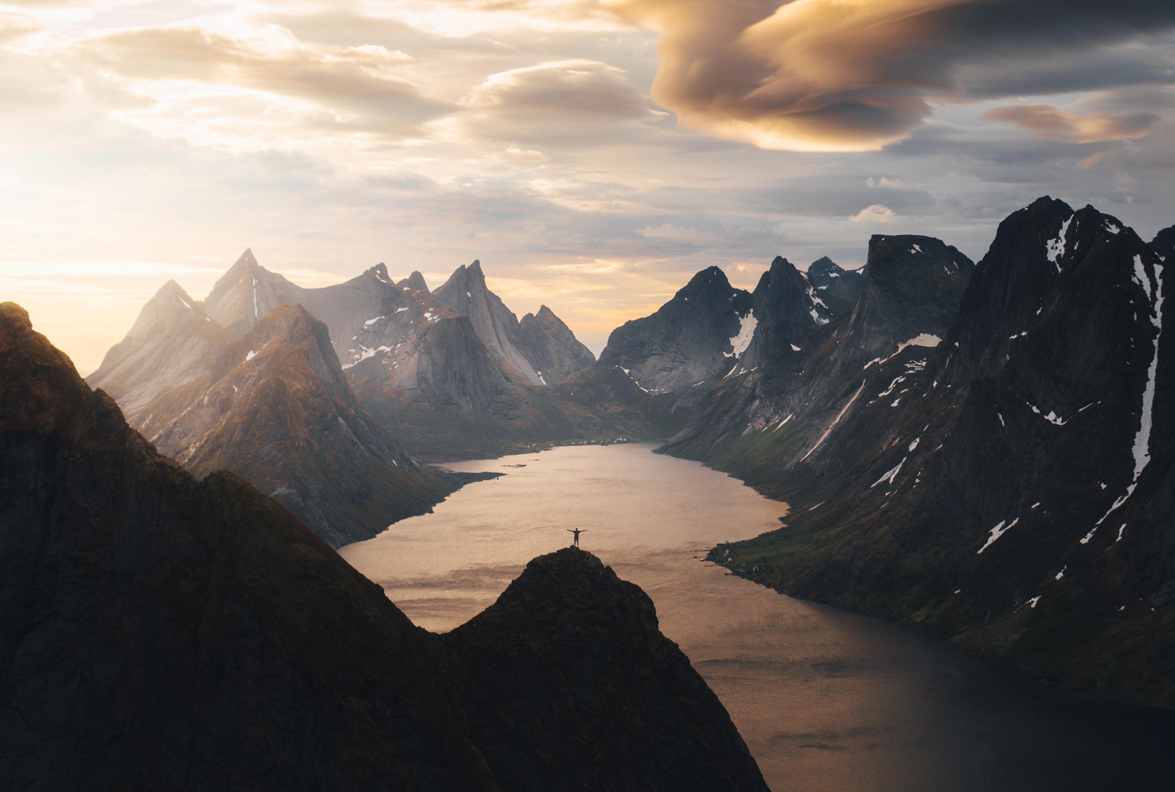 Mountain hike under the midnight sun in Lofoten