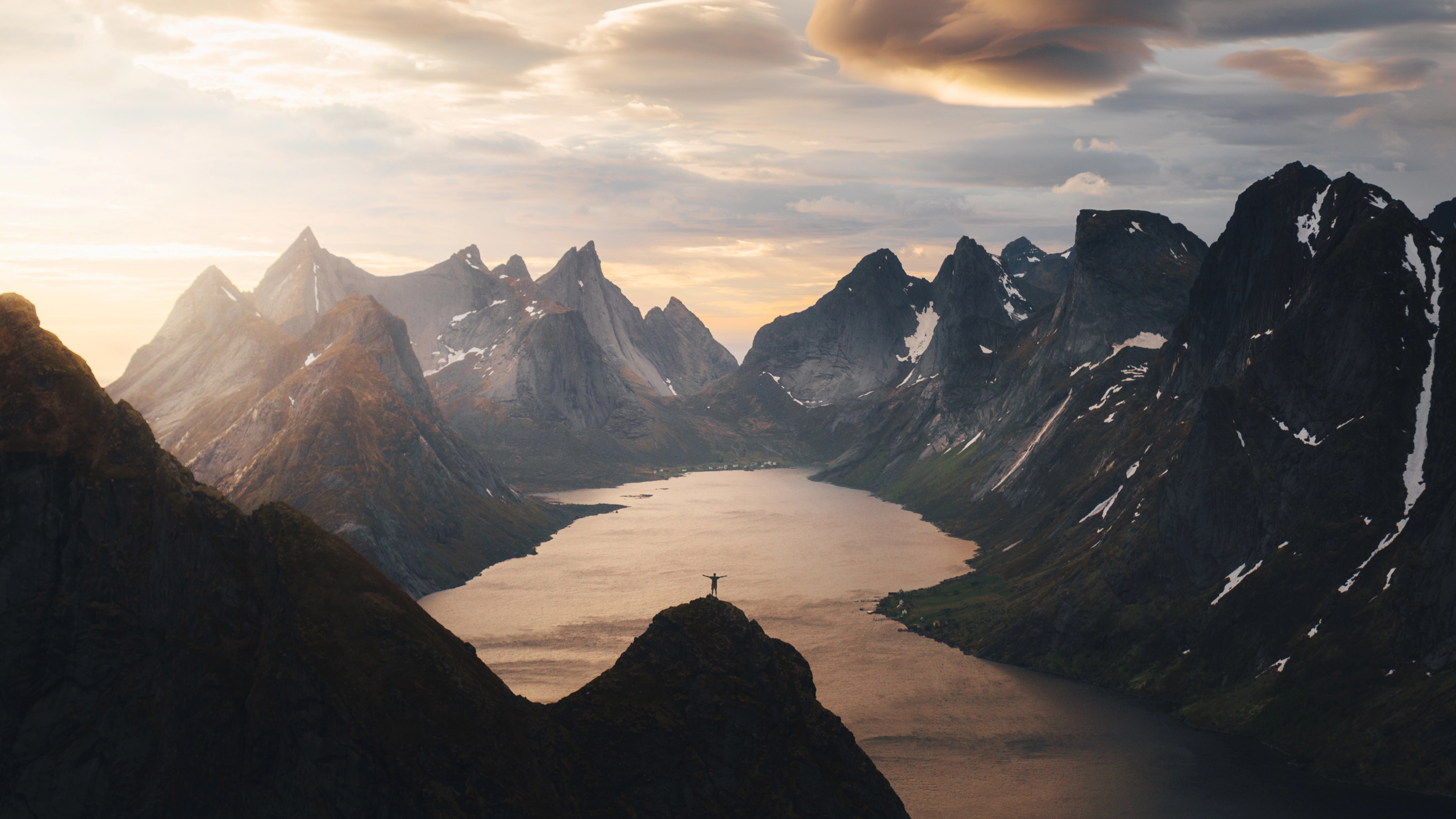 Mountain hike under the midnight sun in Lofoten