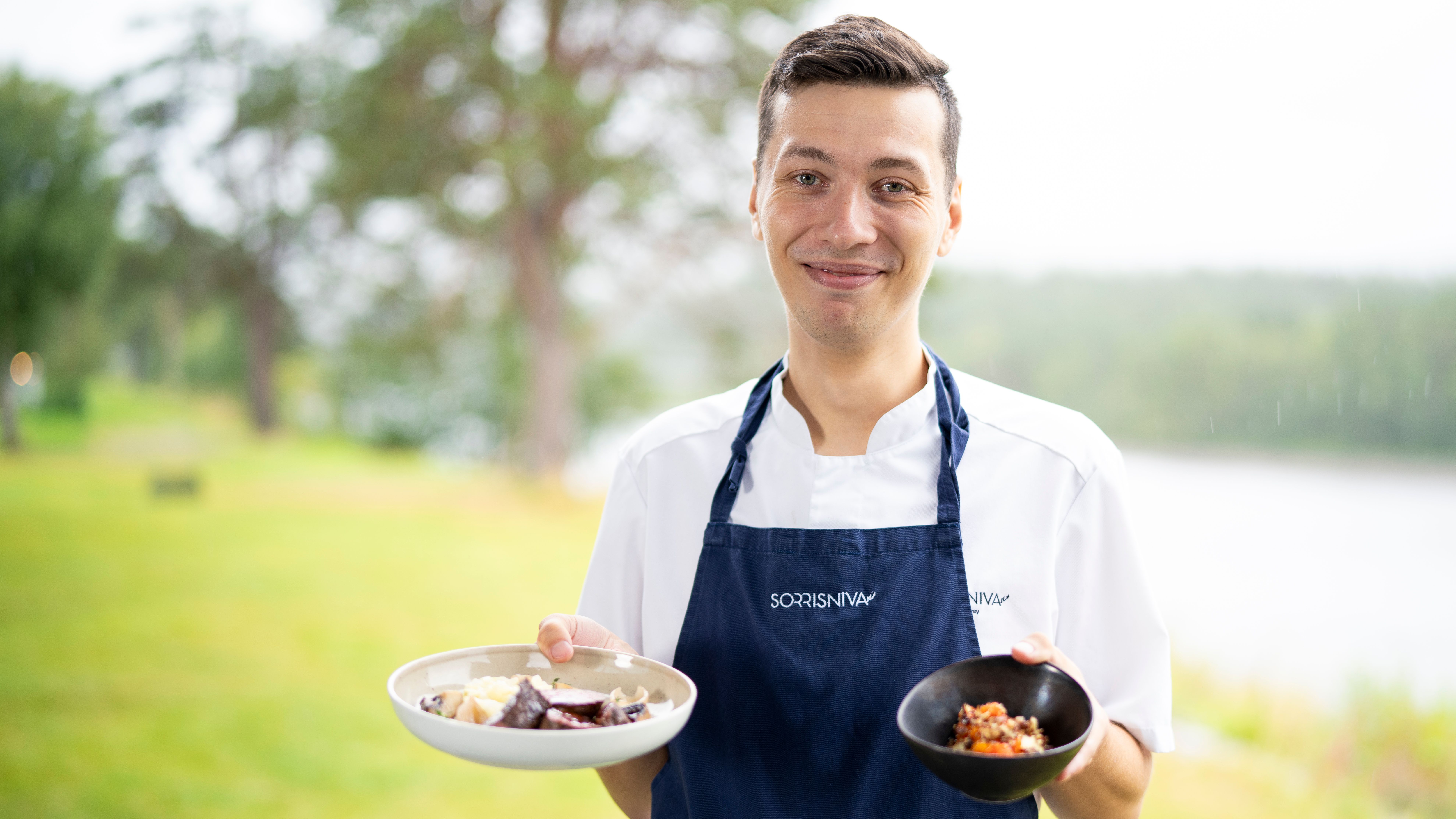 Chef Magnus Kristiansen showing off his dishes at Sorrisniva in Alta