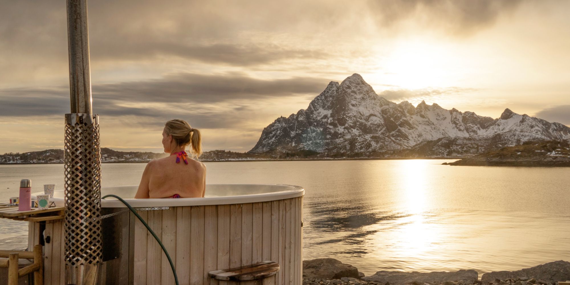 Woman in jacuzzi in Lofoten