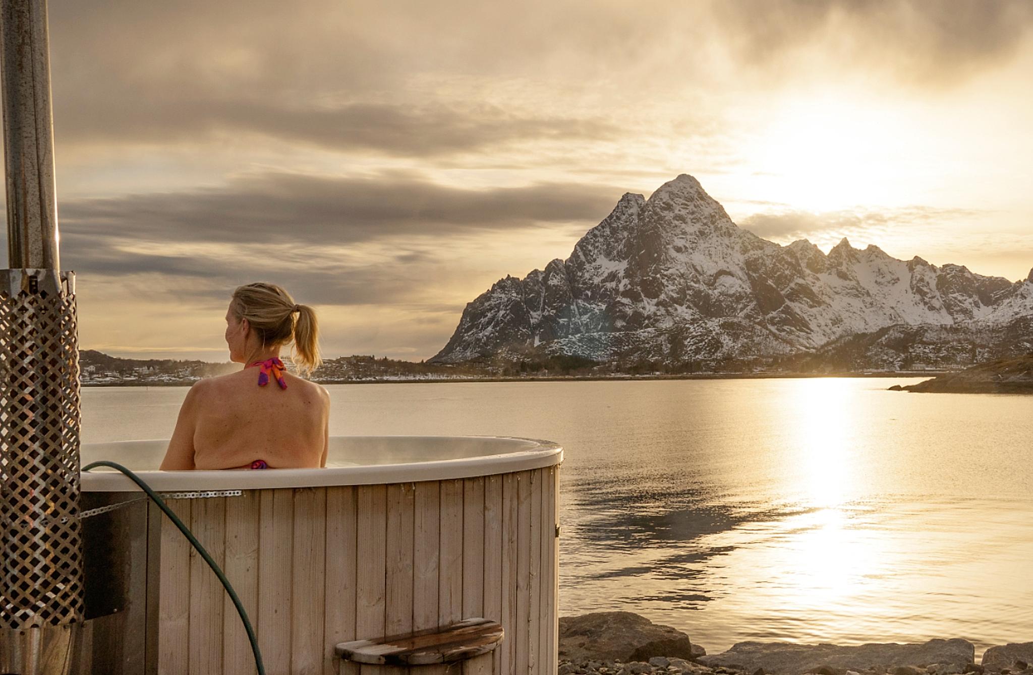 Woman in jacuzzi in Lofoten
