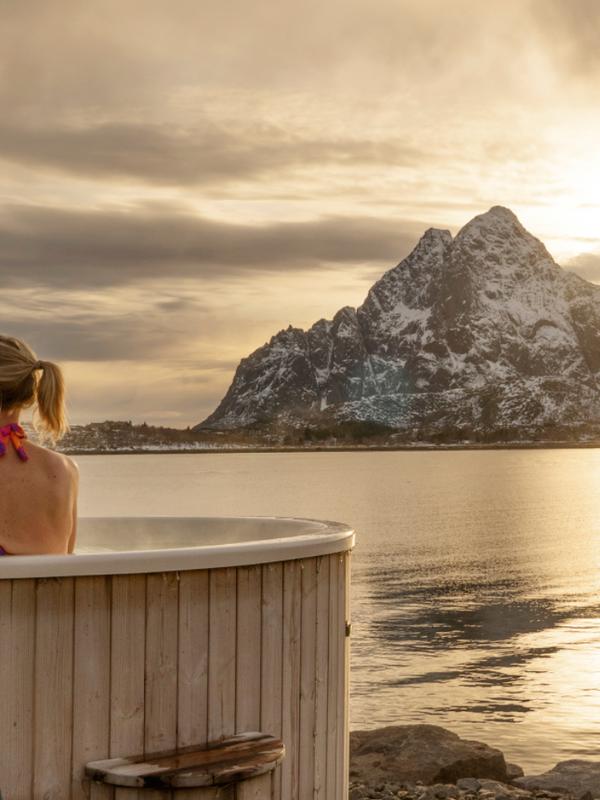 Woman in jacuzzi in Lofoten