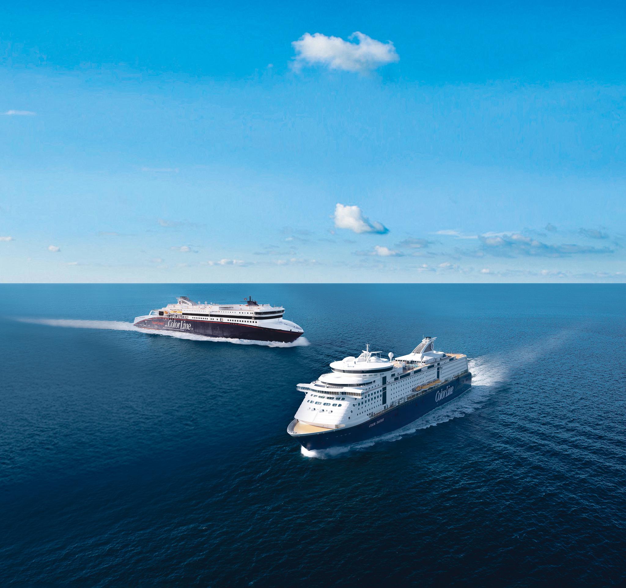 Travel to Norway by ferry: To Color Line ferries crossing paths on the ocean