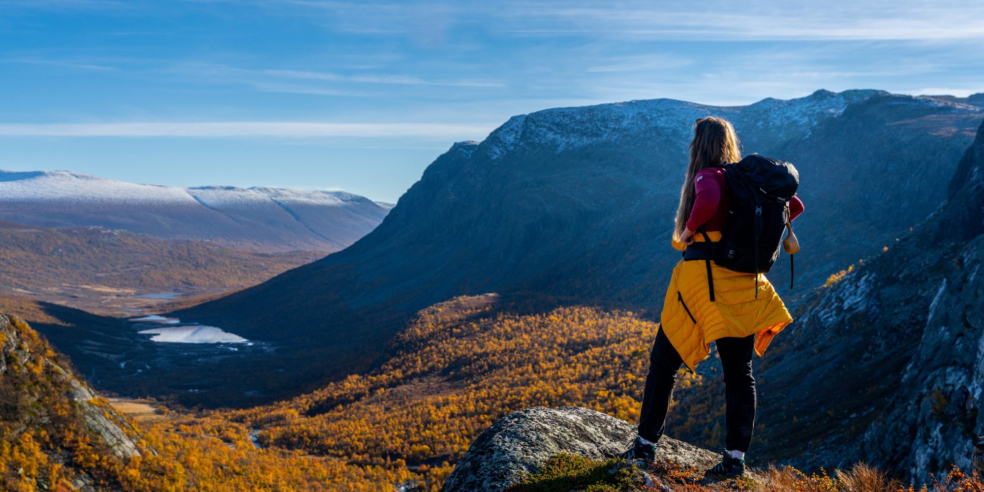 A person overlooking the beautiful vally of Hydalen