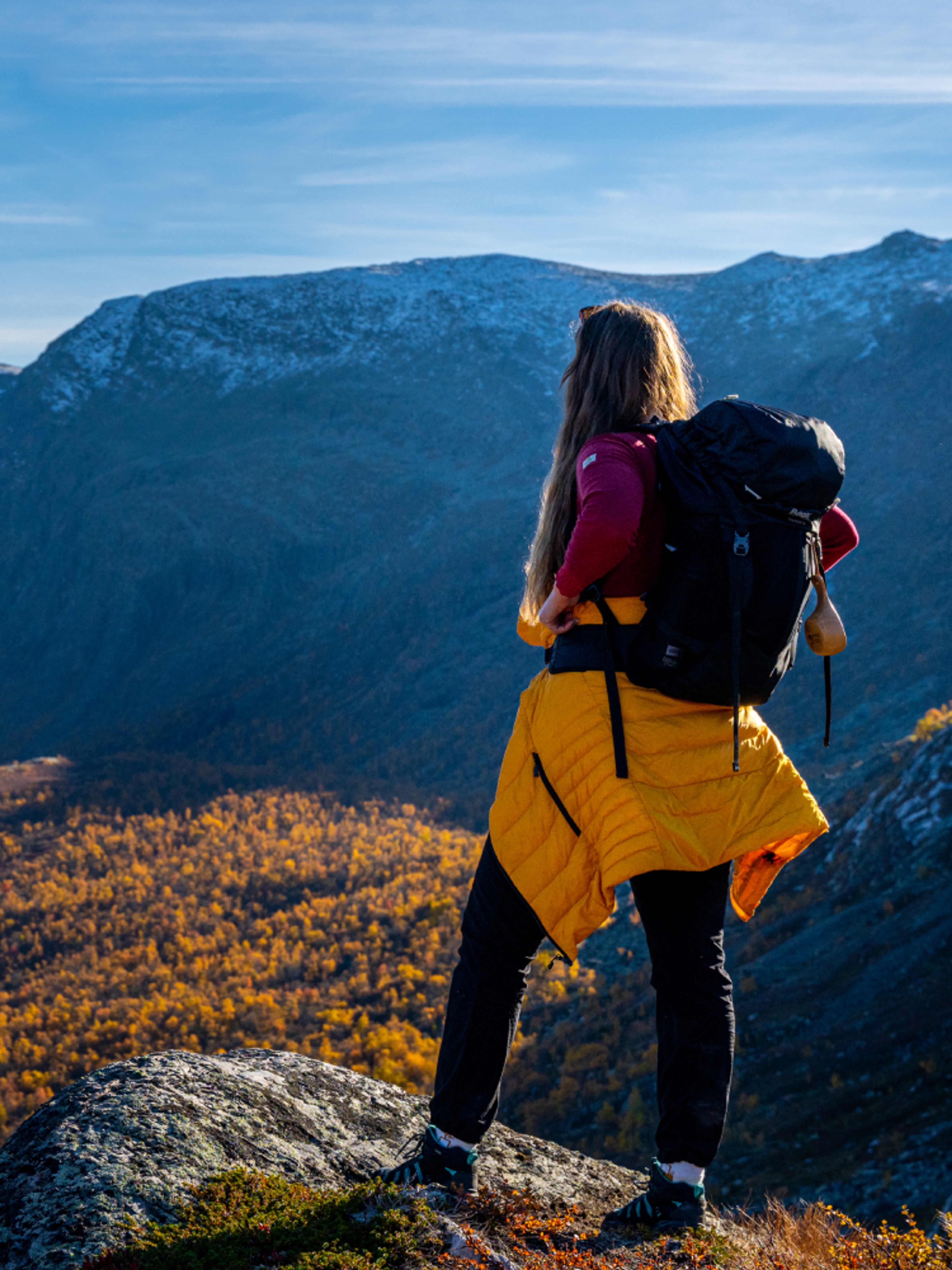 A person overlooking the beautiful vally of Hydalen