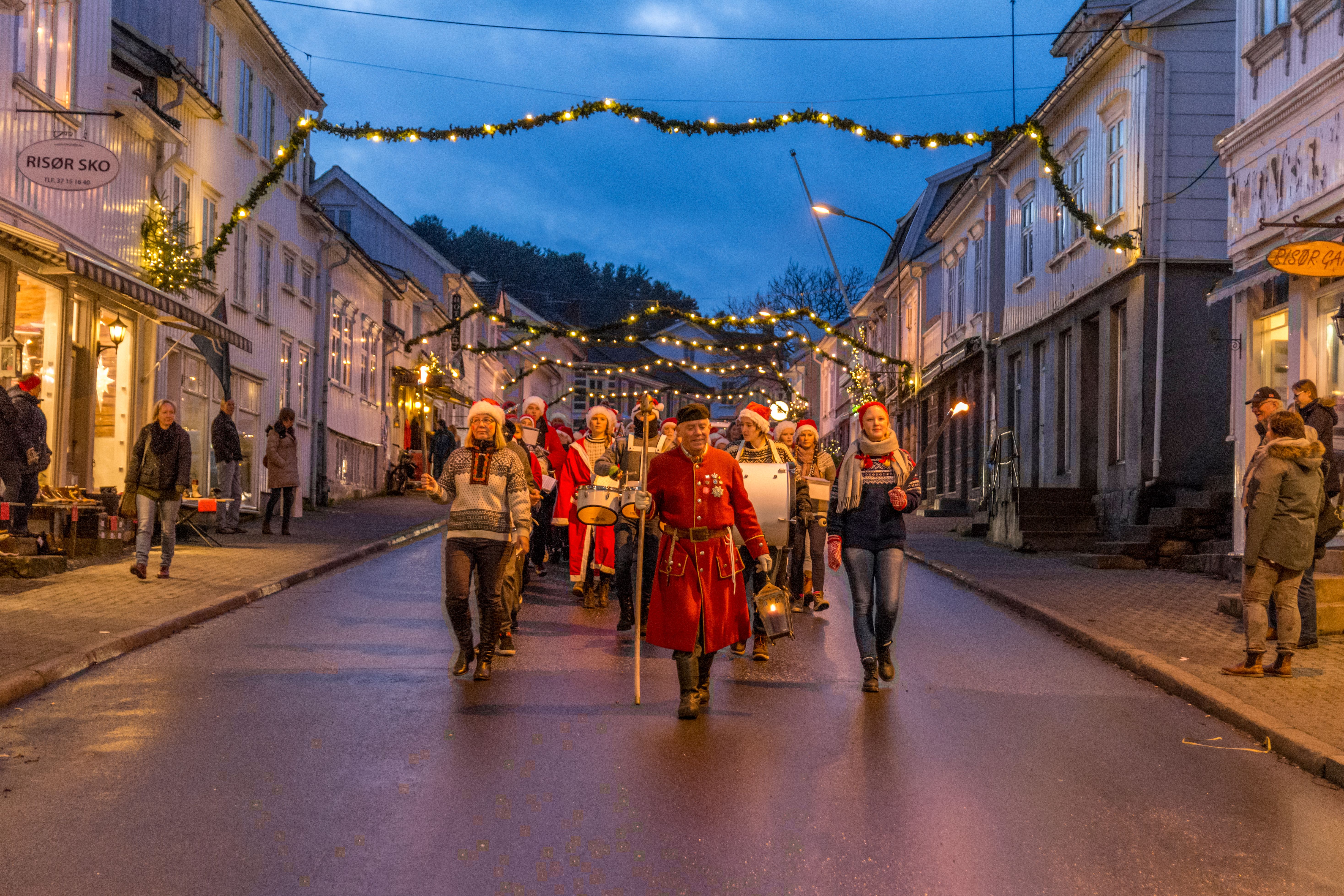 A traditional watchman in front of a Christmas parade in Risør, Southern Norway.