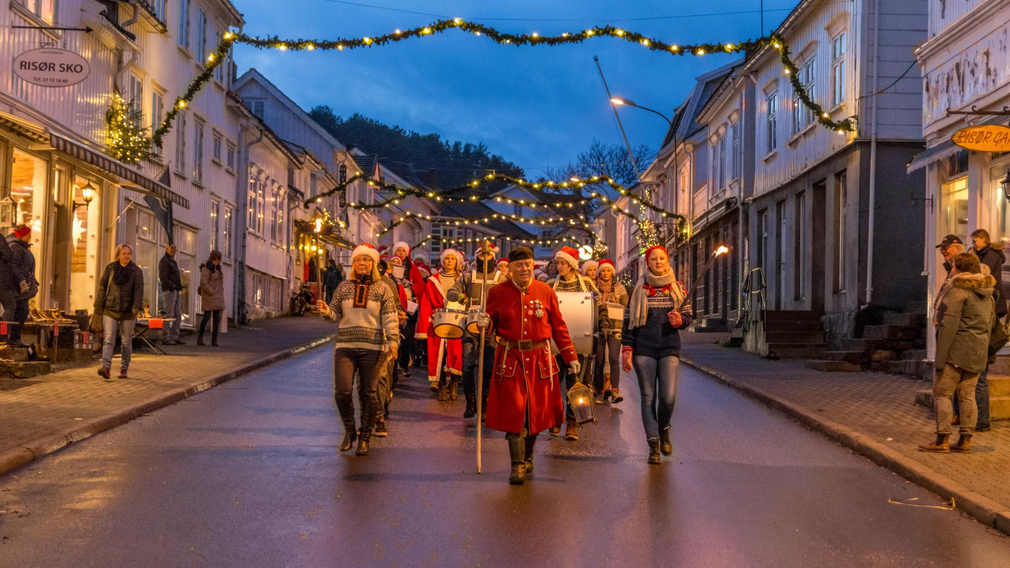 A traditional watchman in front of a Christmas parade in Risør, Southern Norway.