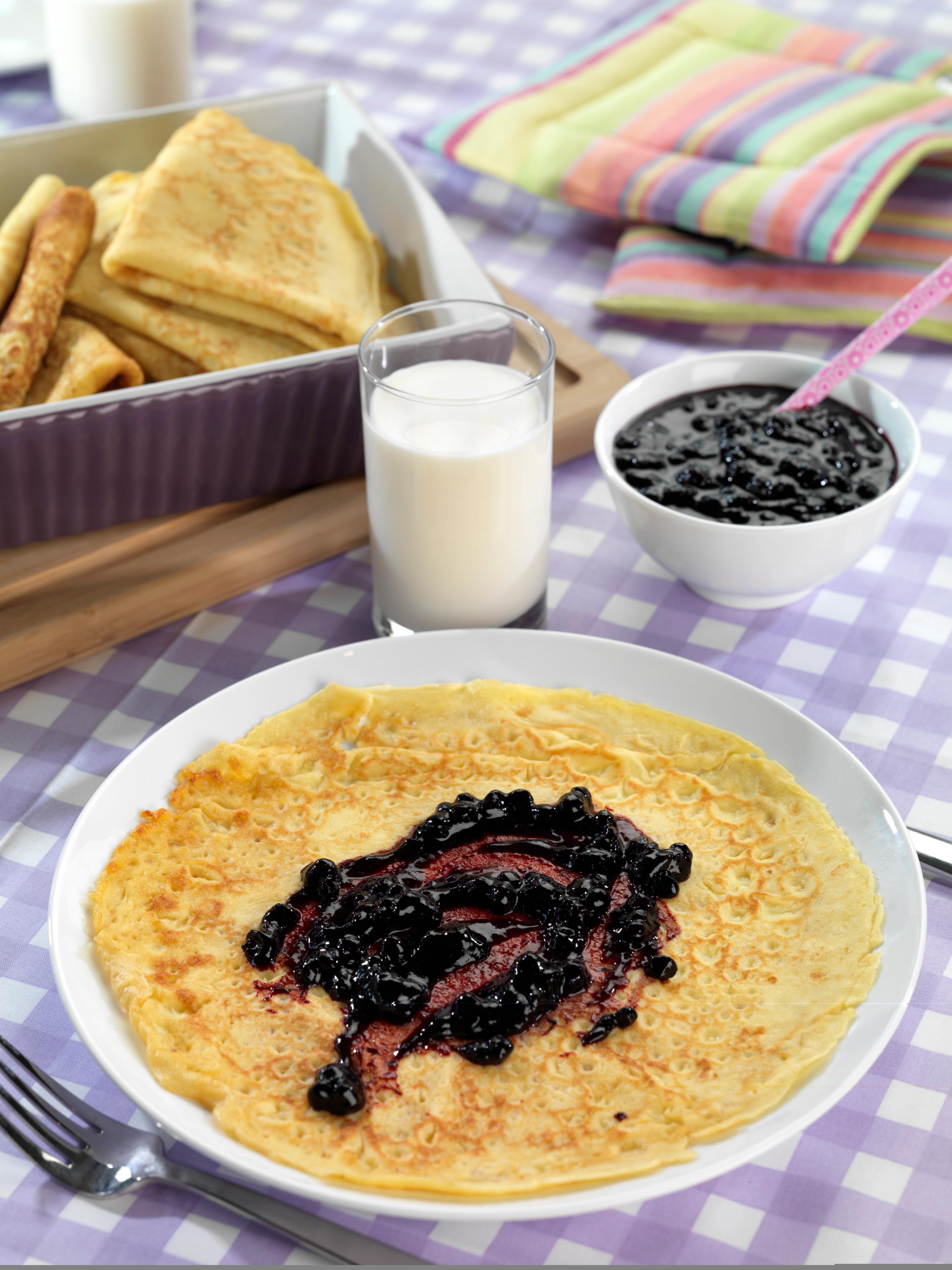 A Norwegian pancake with blueberry jam