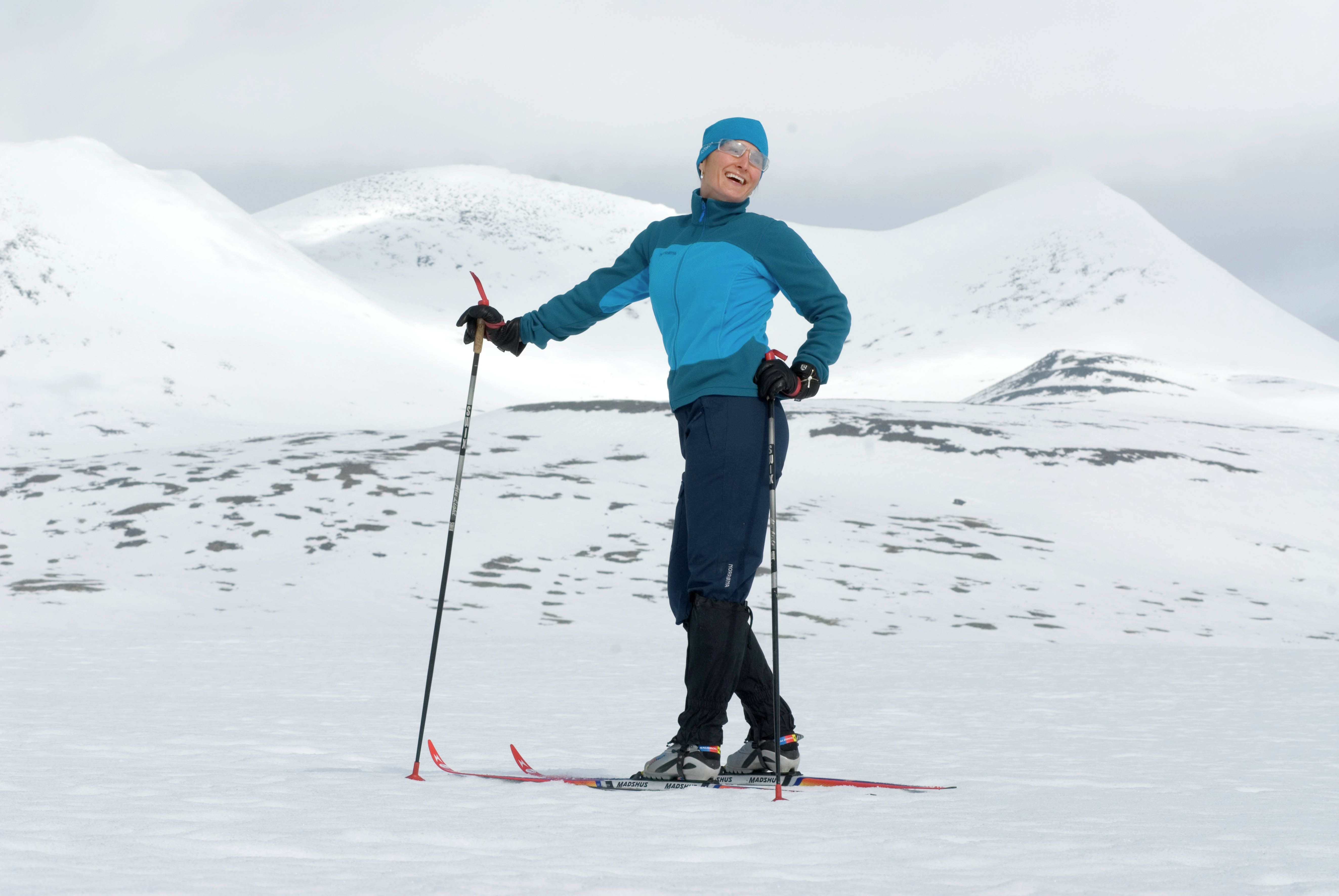 Female skier in the mountains