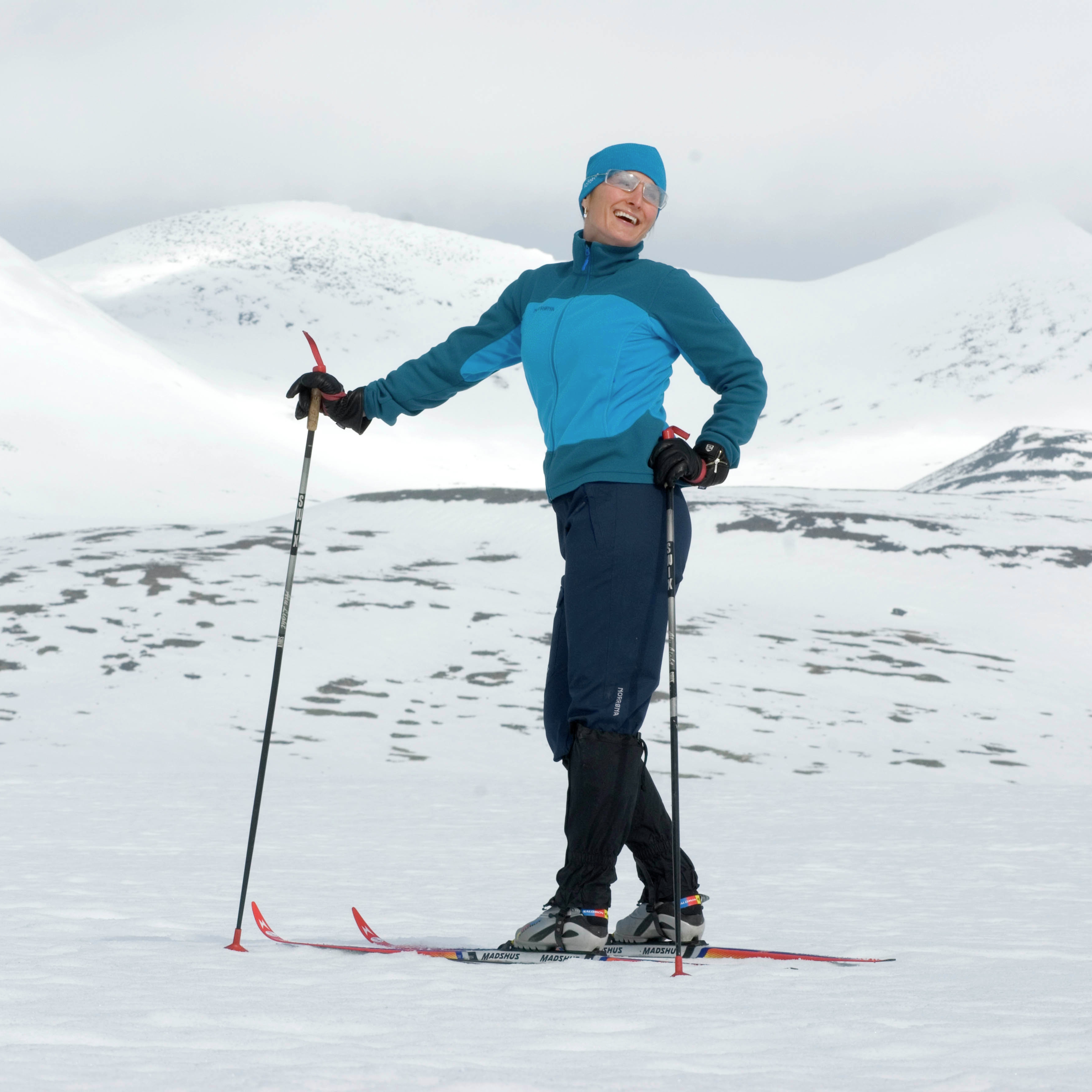 Female skier in the mountains