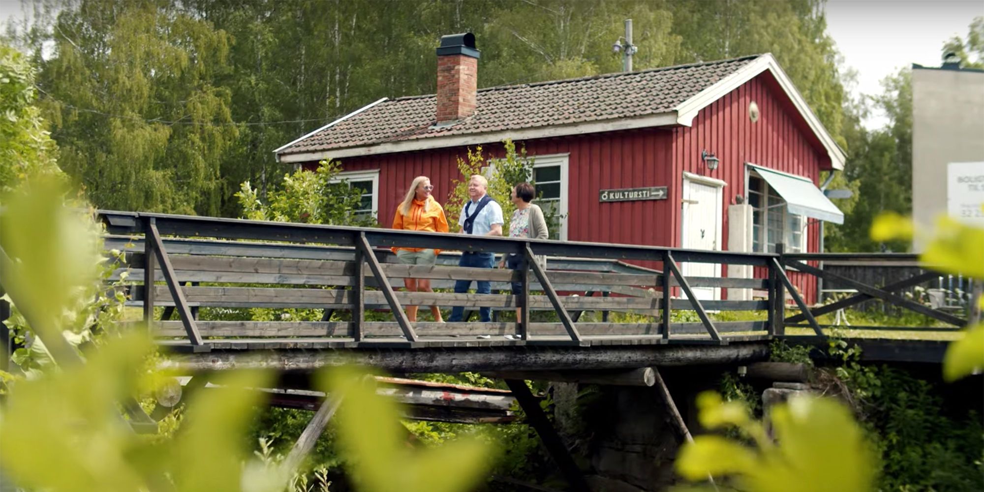 Three friends walking across a bridge in Eidsfoss, Vestfold