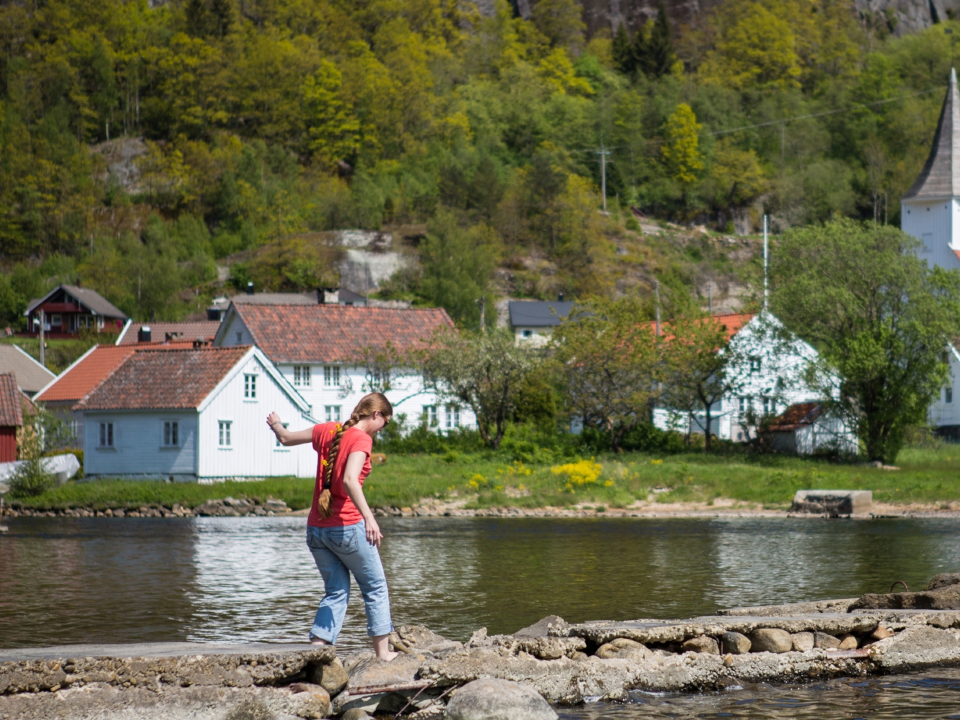 A woman by the fjord in Feda in Kvinesdal, Southern Norway